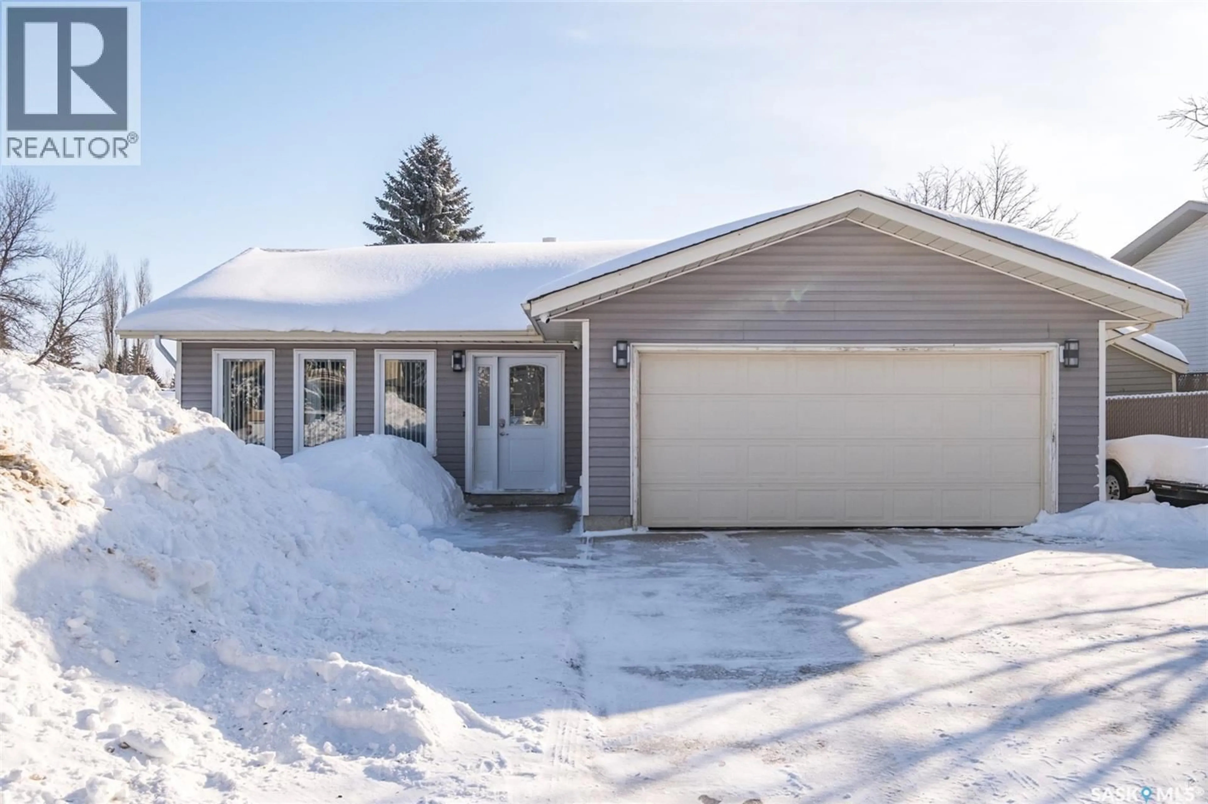 Home with vinyl exterior material, street for 1503 BLISS CRESCENT, Prince Albert Saskatchewan S6V7W7