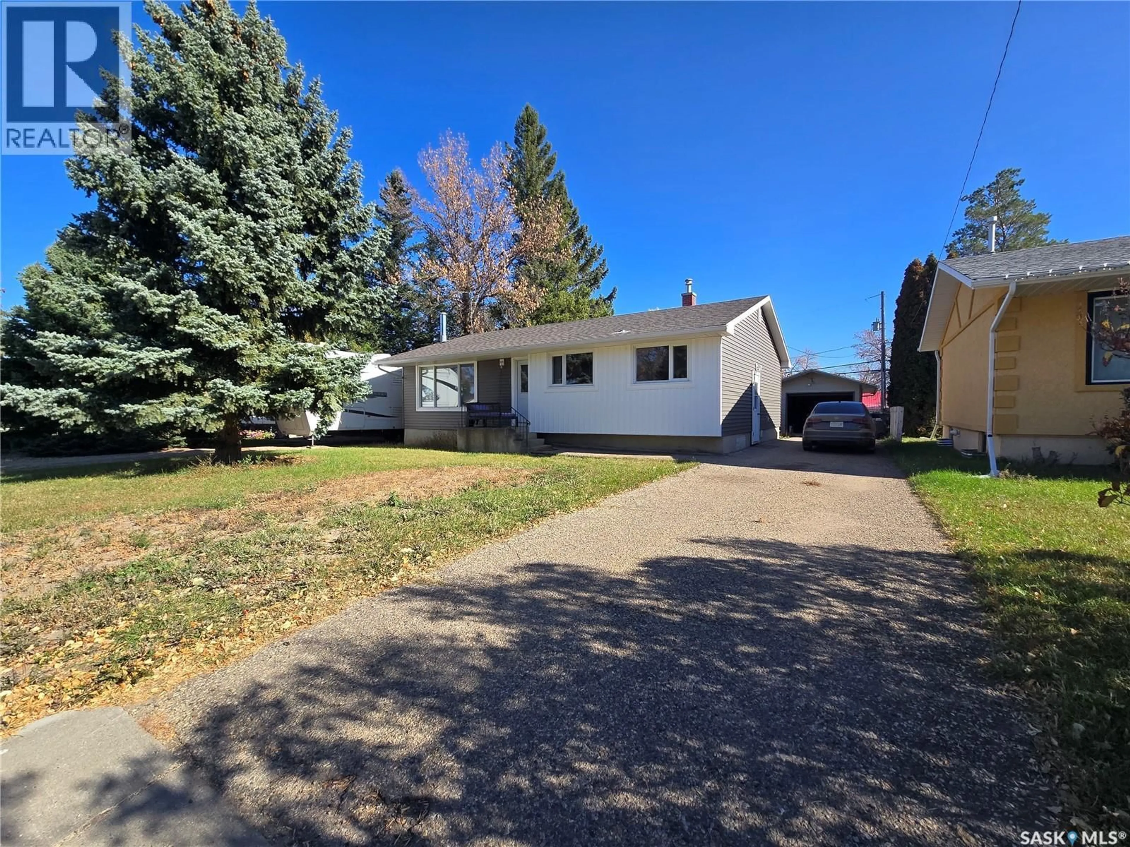 A pic from outside/outdoor area/front of a property/back of a property/a pic from drone, street for E - 719 3RD STREET, Assiniboia Saskatchewan S0H0B0