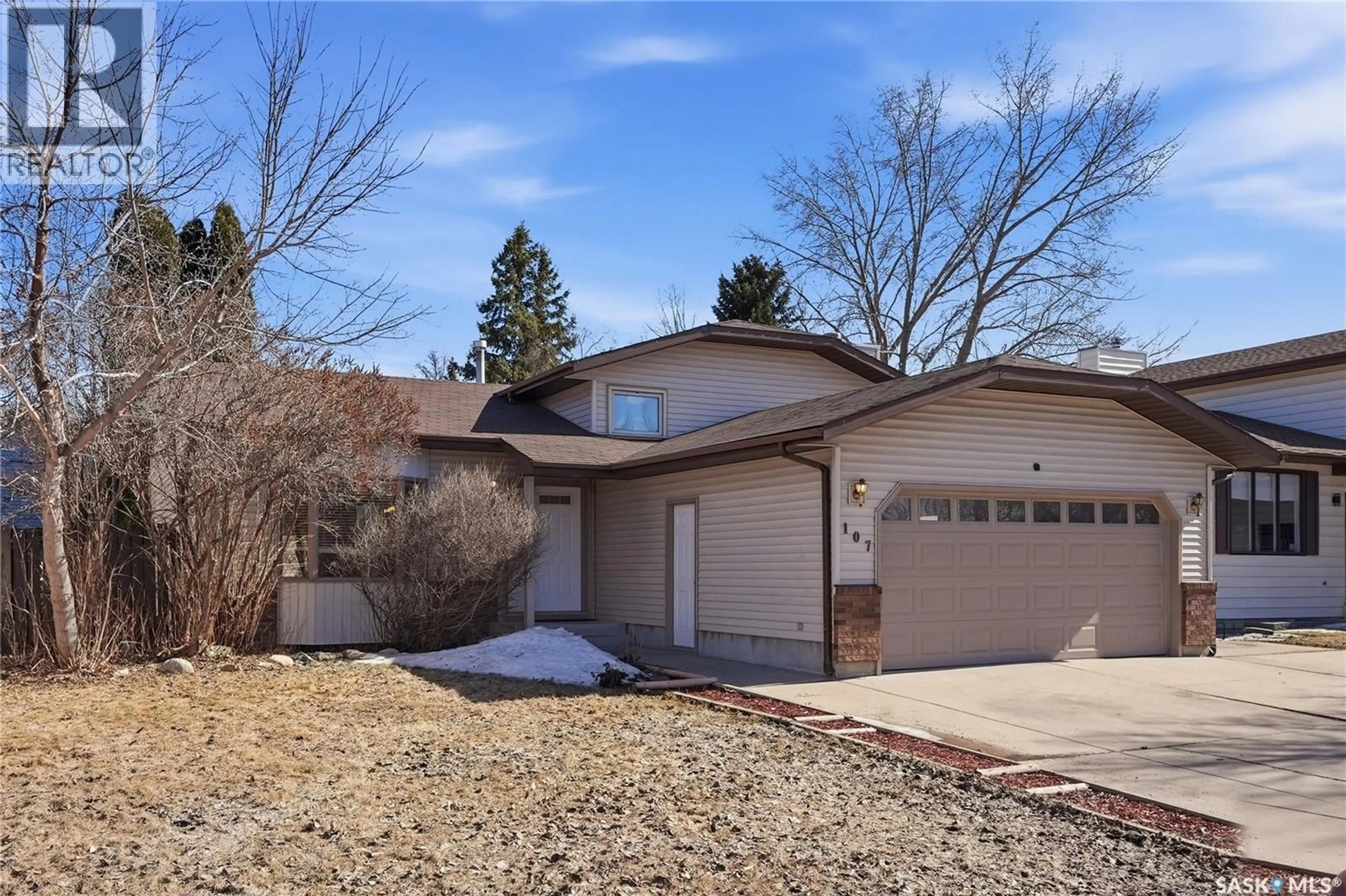 Home with vinyl exterior material, street for 107 ARMSTRONG CRESCENT, Saskatoon Saskatchewan S7N3M4