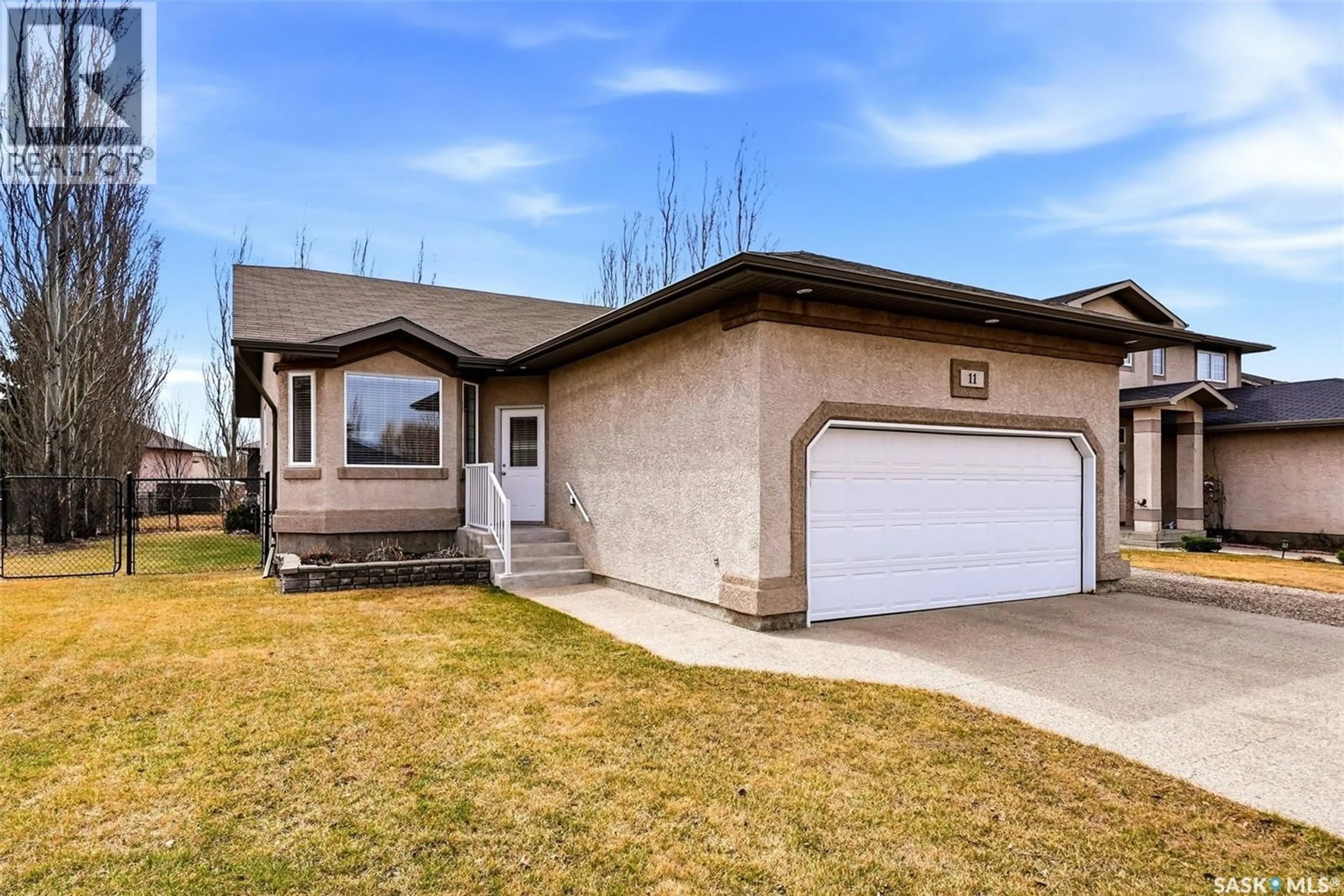 Home with vinyl exterior material, street for 11 FAIRWAY CRESCENT, White City Saskatchewan S4L0A8