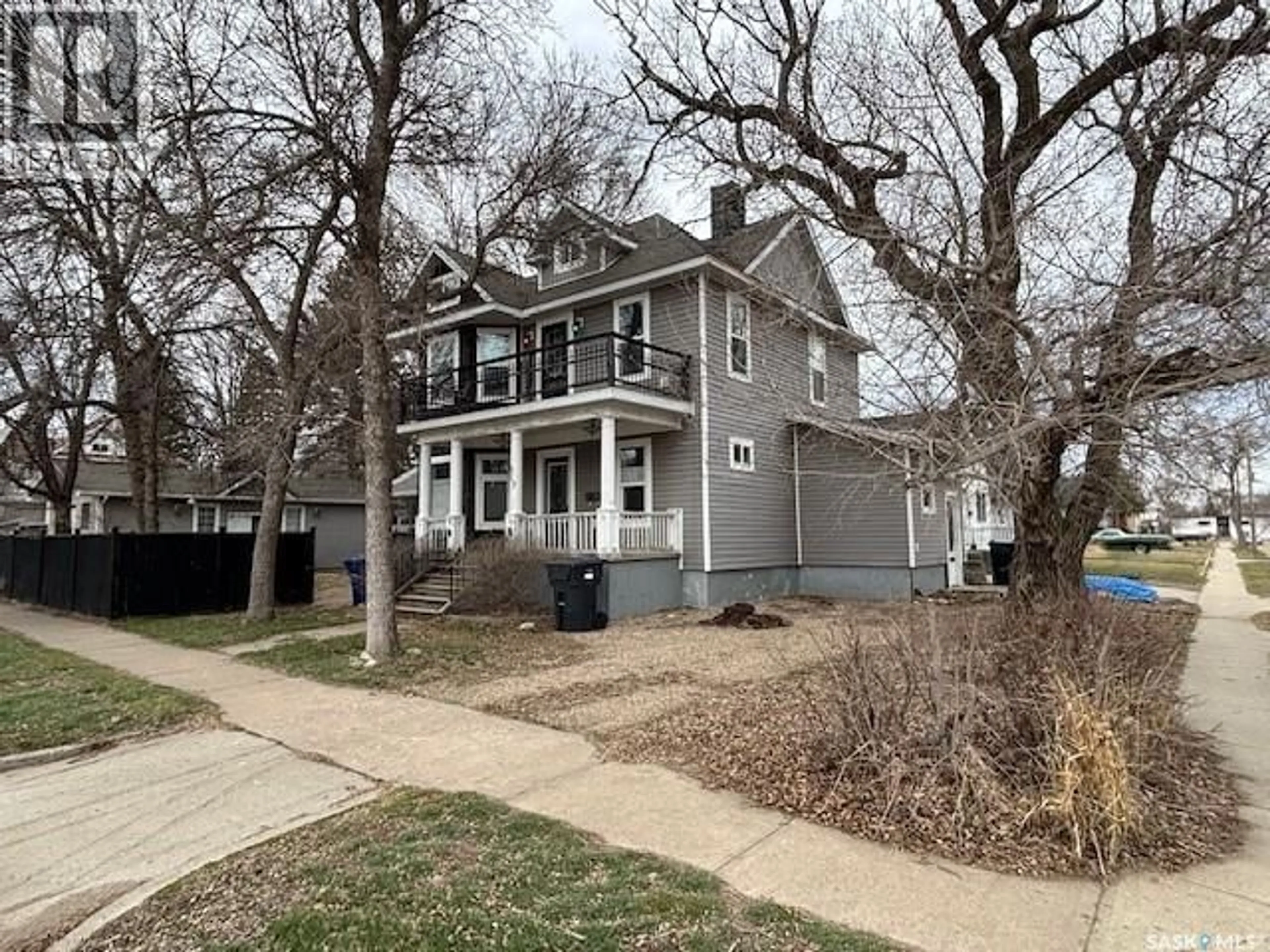 Home with vinyl exterior material, street for 617 BISON AVENUE, Weyburn Saskatchewan S4H0J7