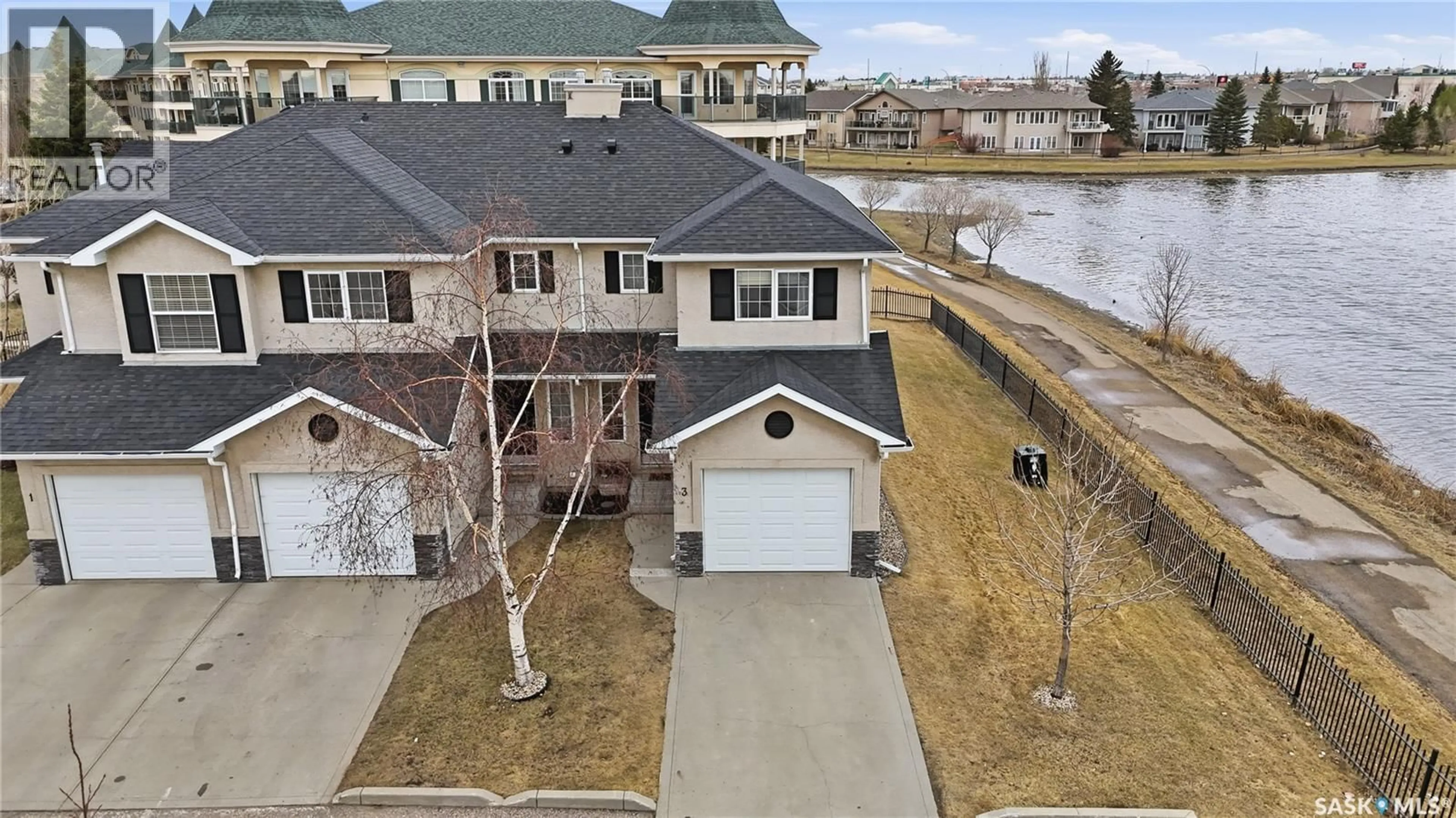 A pic from outside/outdoor area/front of a property/back of a property/a pic from drone, water/lake/river/ocean view for 3 2400 TELL PLACE, Regina Saskatchewan S4V3E3