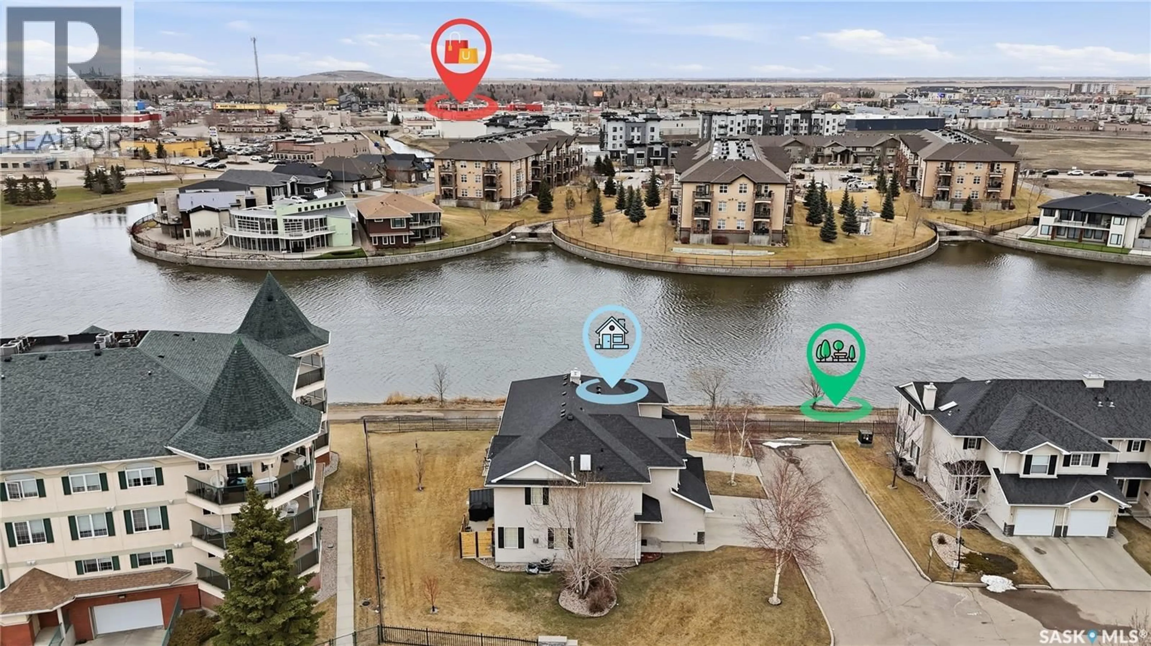 A pic from outside/outdoor area/front of a property/back of a property/a pic from drone, water/lake/river/ocean view for 3 2400 TELL PLACE, Regina Saskatchewan S4V3E3