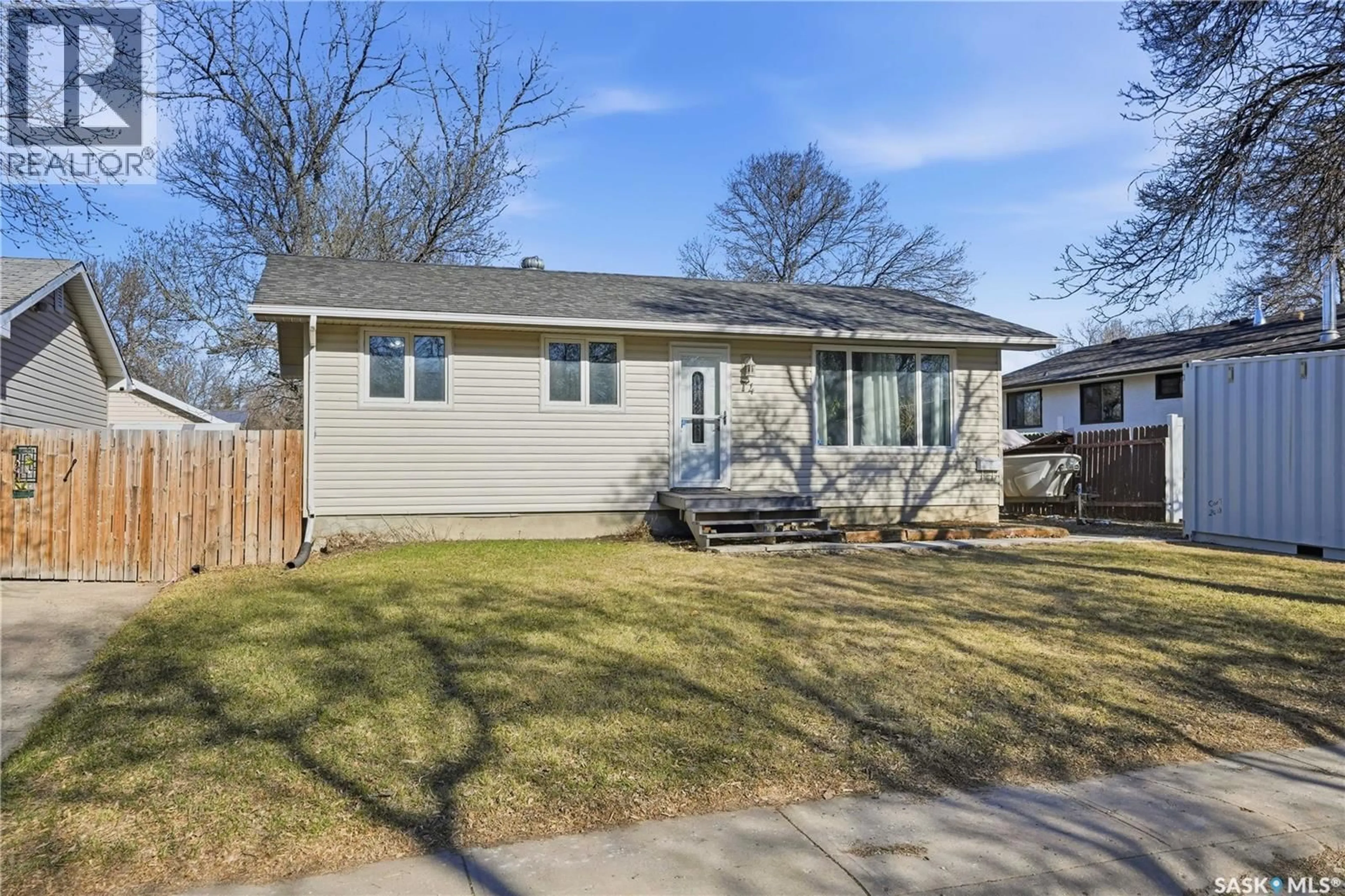 Home with vinyl exterior material, street for 74 OSBORNE CRESCENT, Regina Saskatchewan S4R5J1