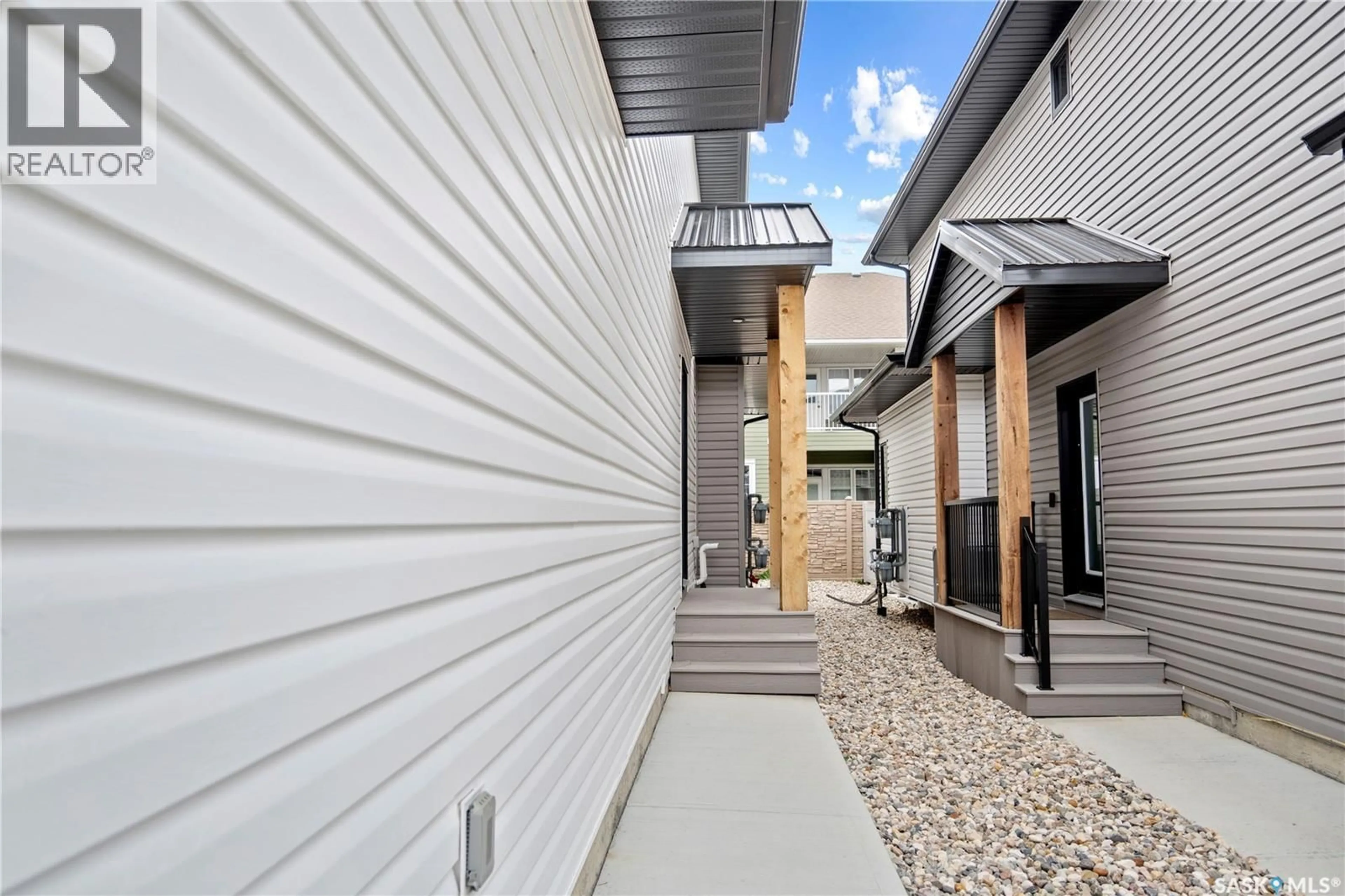 Patio, street for 110 - 3121 GREEN BANK ROAD, Regina Saskatchewan S4V3X5