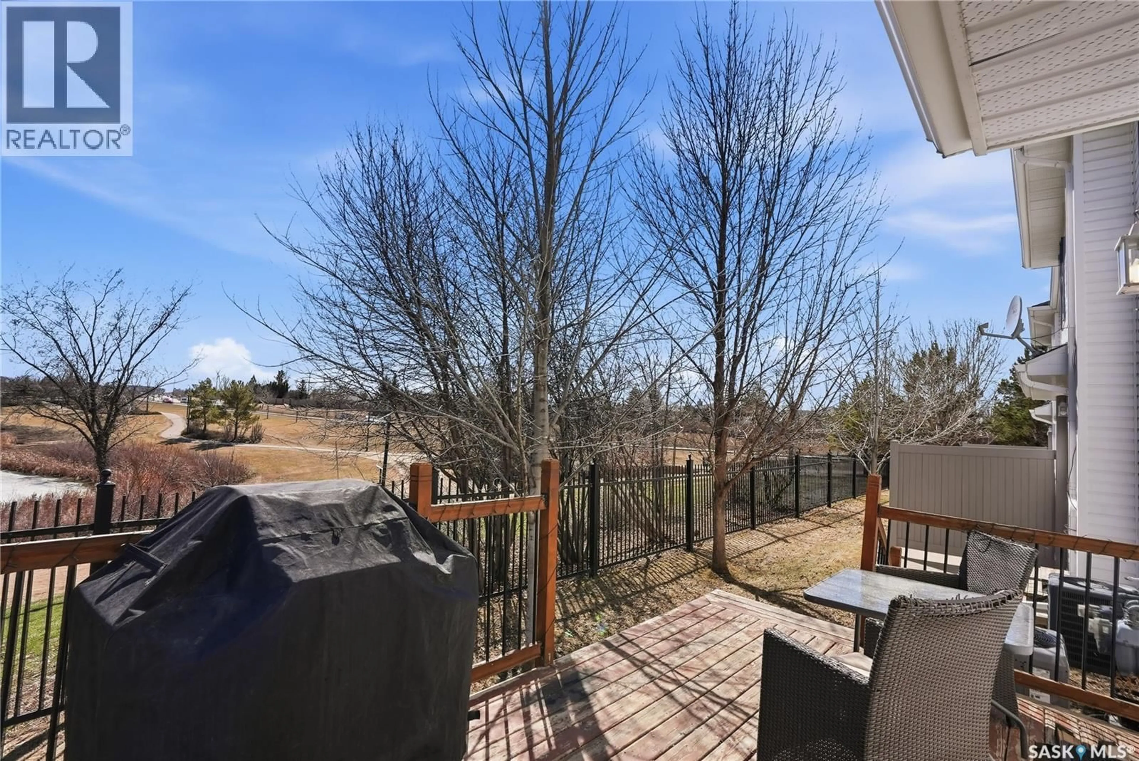 Patio, water/lake/river/ocean view for 148 203 HEROLD TERRACE, Saskatoon Saskatchewan S7V1H8