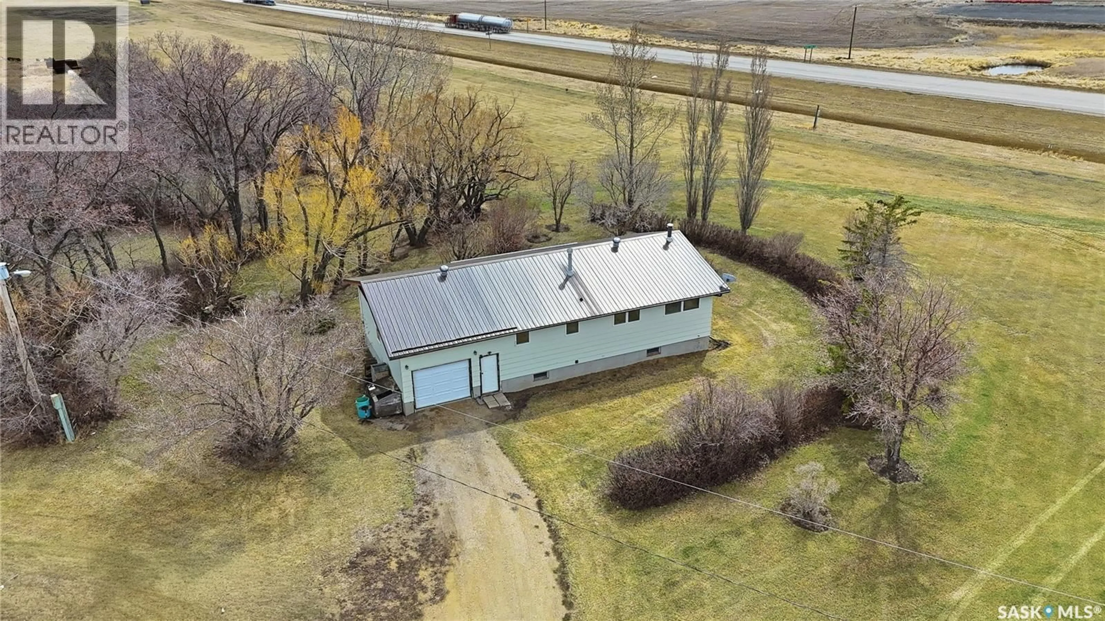 A pic from outside/outdoor area/front of a property/back of a property/a pic from drone, building for 98 MAIN STREET, Lang Saskatchewan S0G2W0