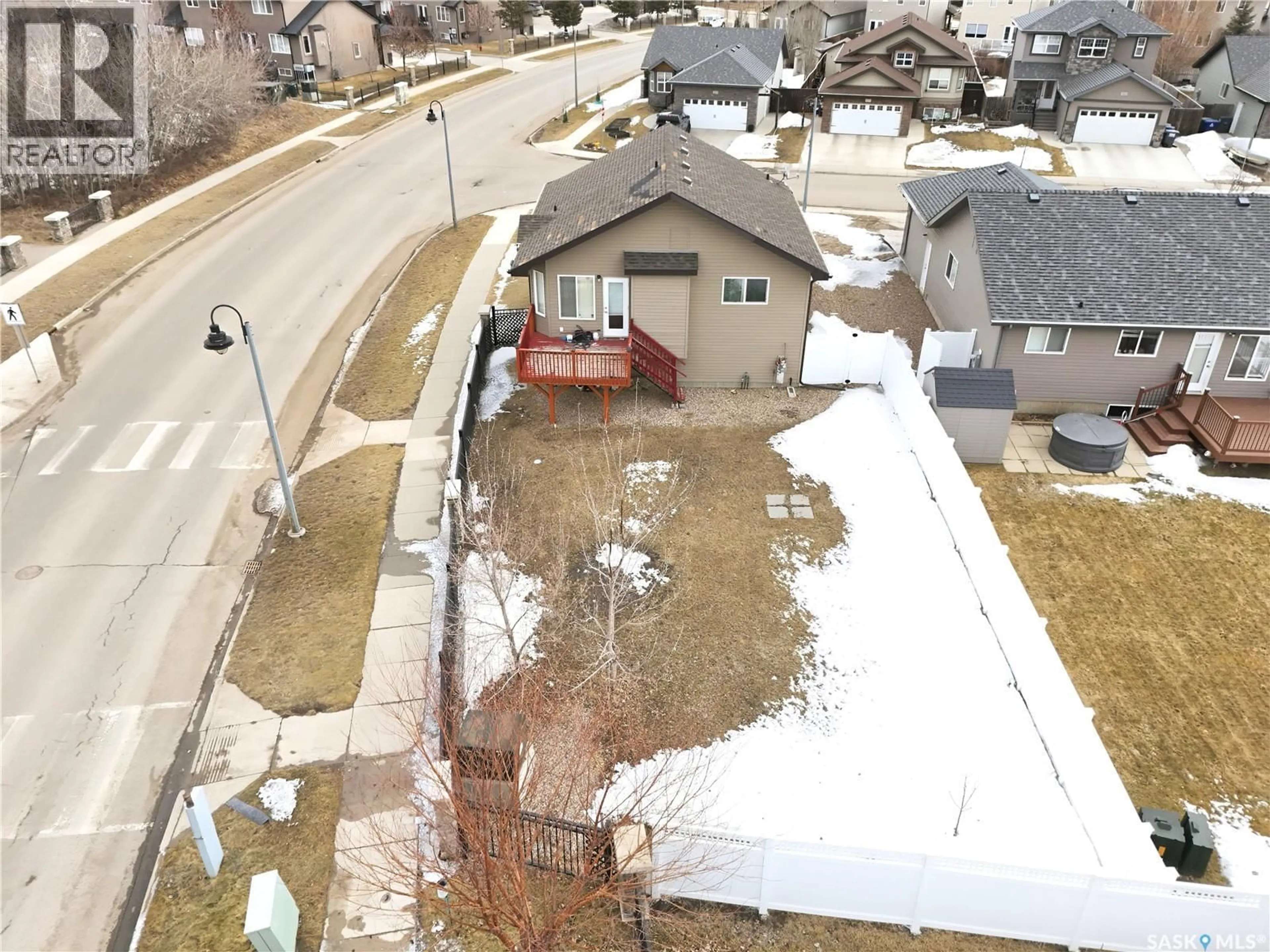 A pic from outside/outdoor area/front of a property/back of a property/a pic from drone, street for 102 WHALLEY CRESCENT, Saskatoon Saskatchewan S7T0H9