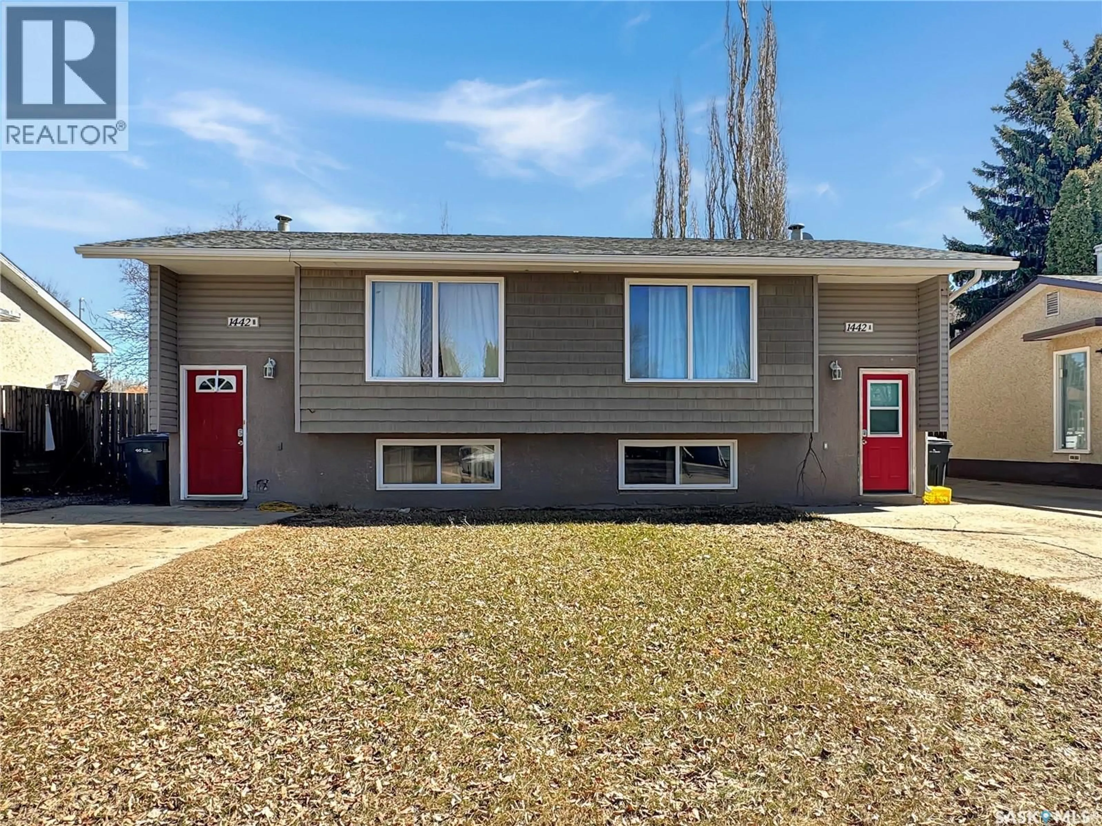 Home with vinyl exterior material, street for 1442 111TH STREET, North Battleford Saskatchewan S9A2K6