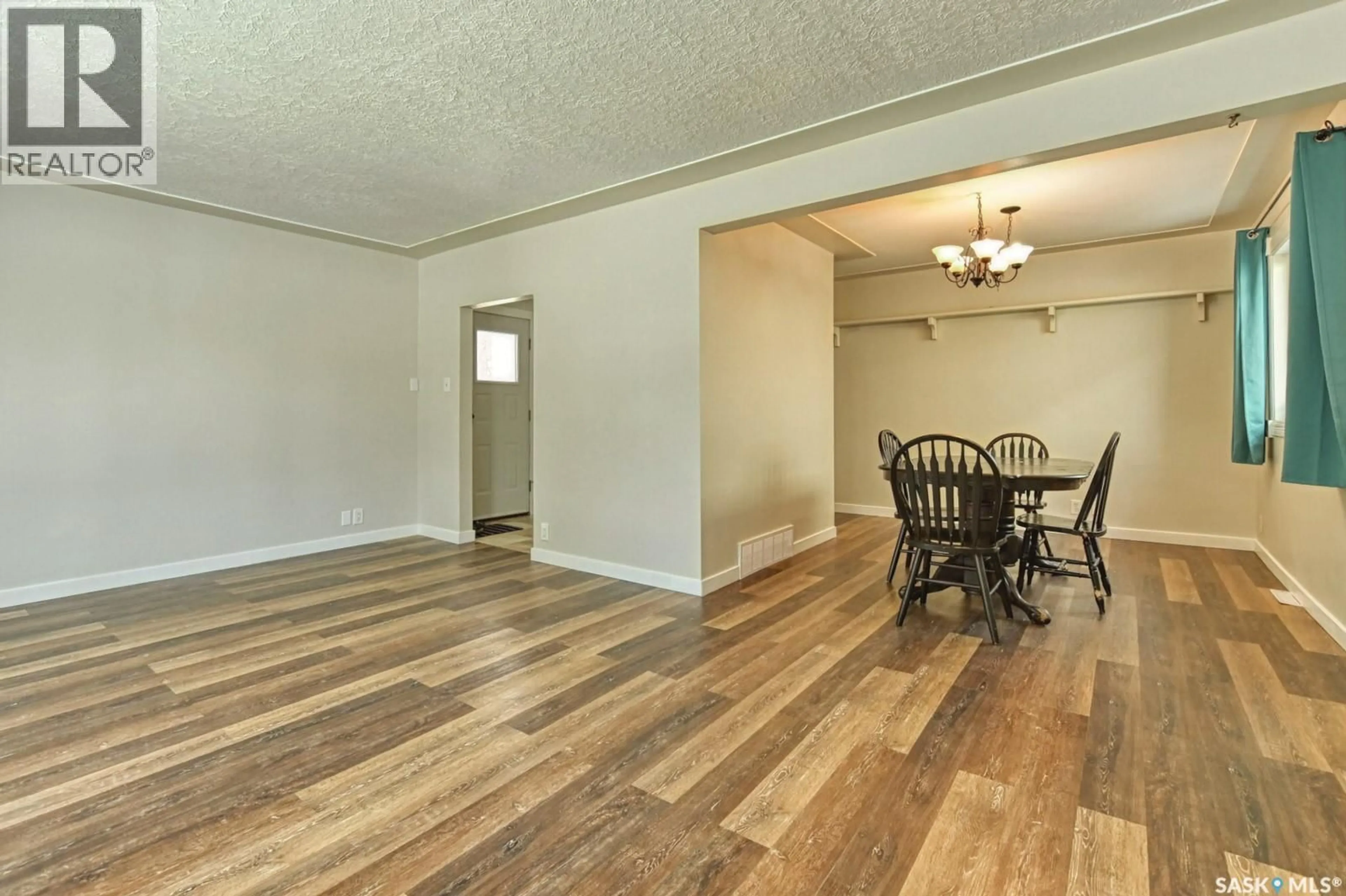 Dining room, wood/laminate floor for 1321 JUBILEE AVENUE, Regina Saskatchewan S4S3S8