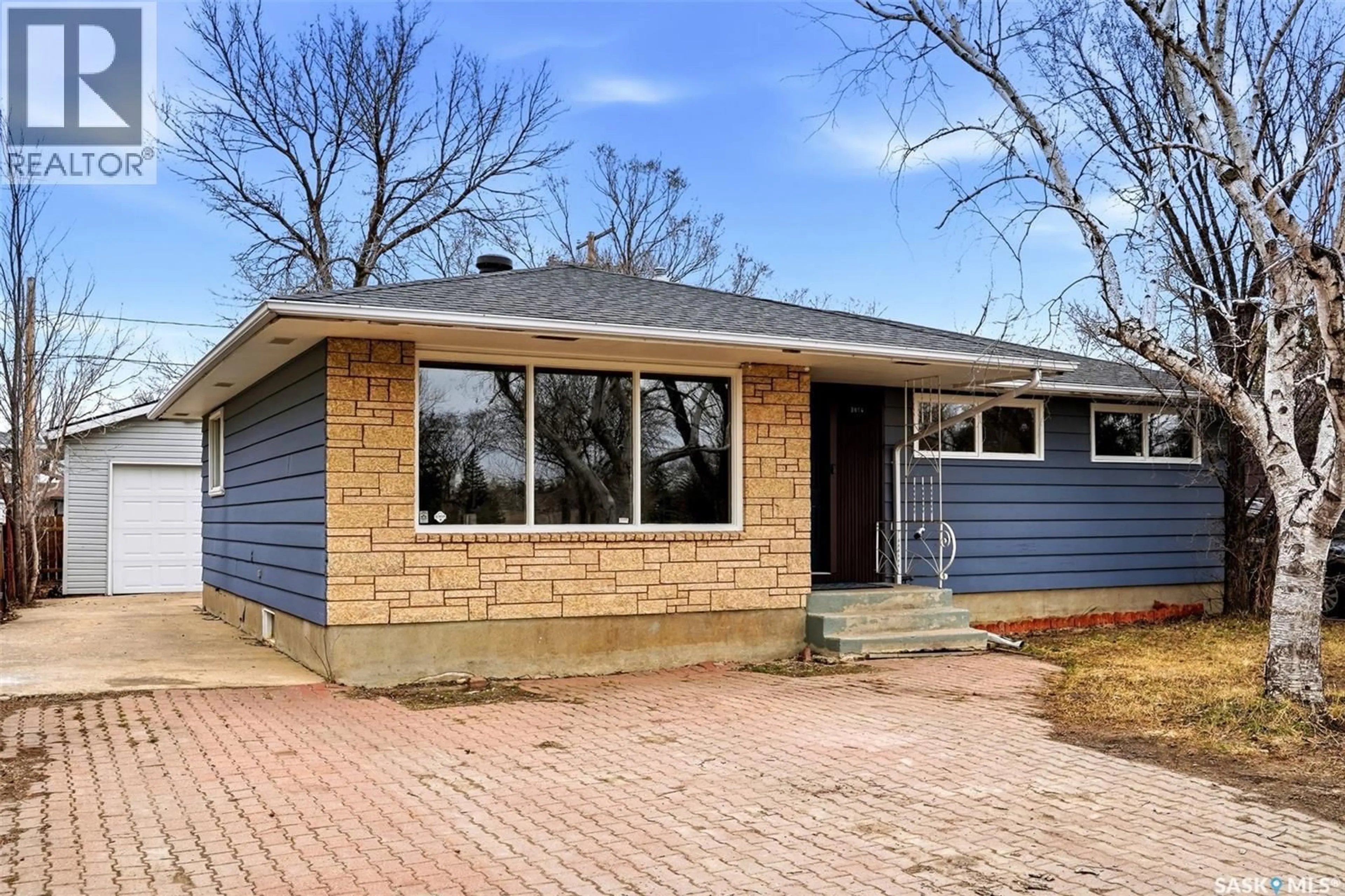 Home with brick exterior material, street for 3814 25TH AVENUE, Regina Saskatchewan S4S1L9