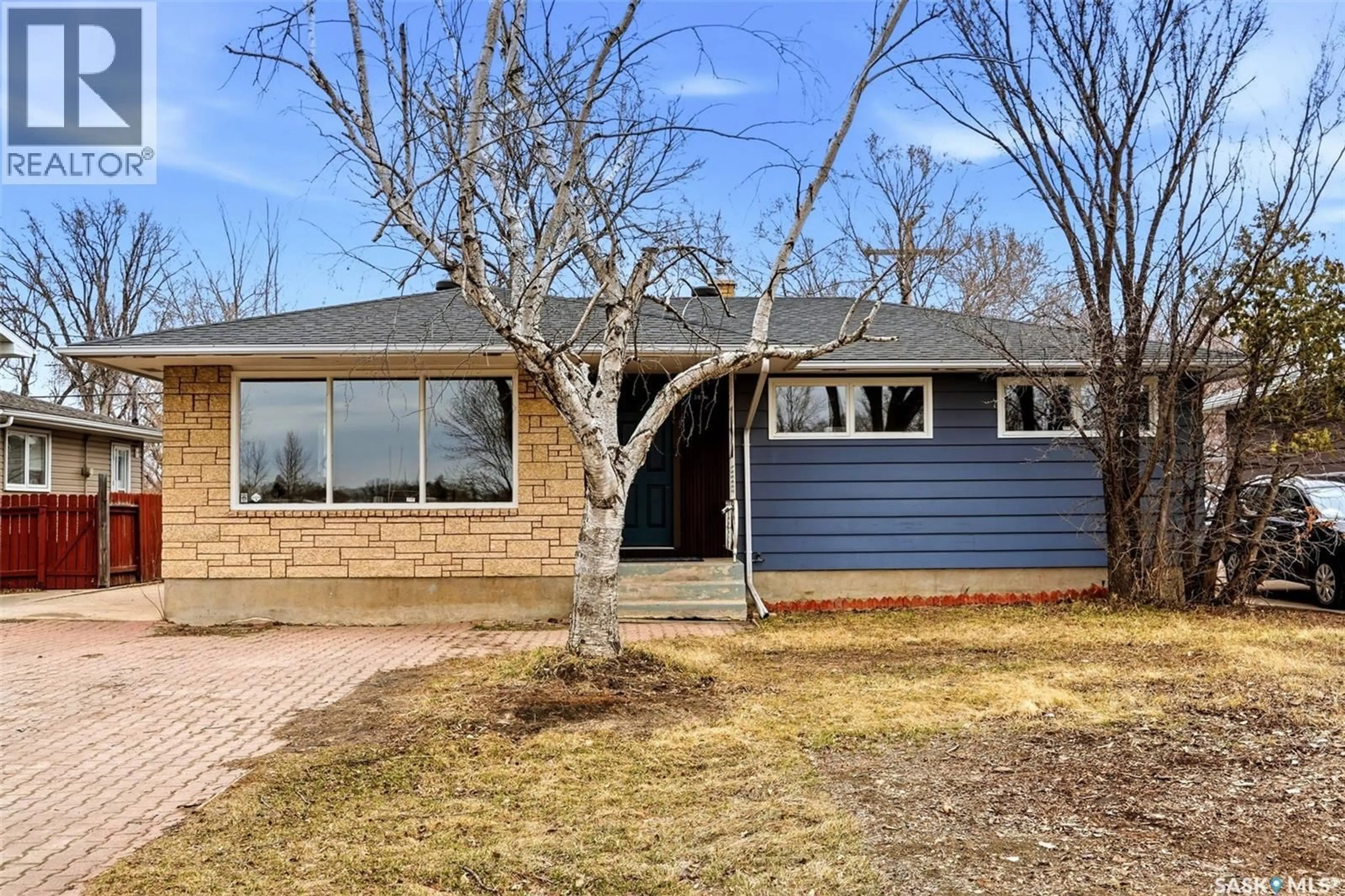 Home with brick exterior material, street for 3814 25TH AVENUE, Regina Saskatchewan S4S1L9