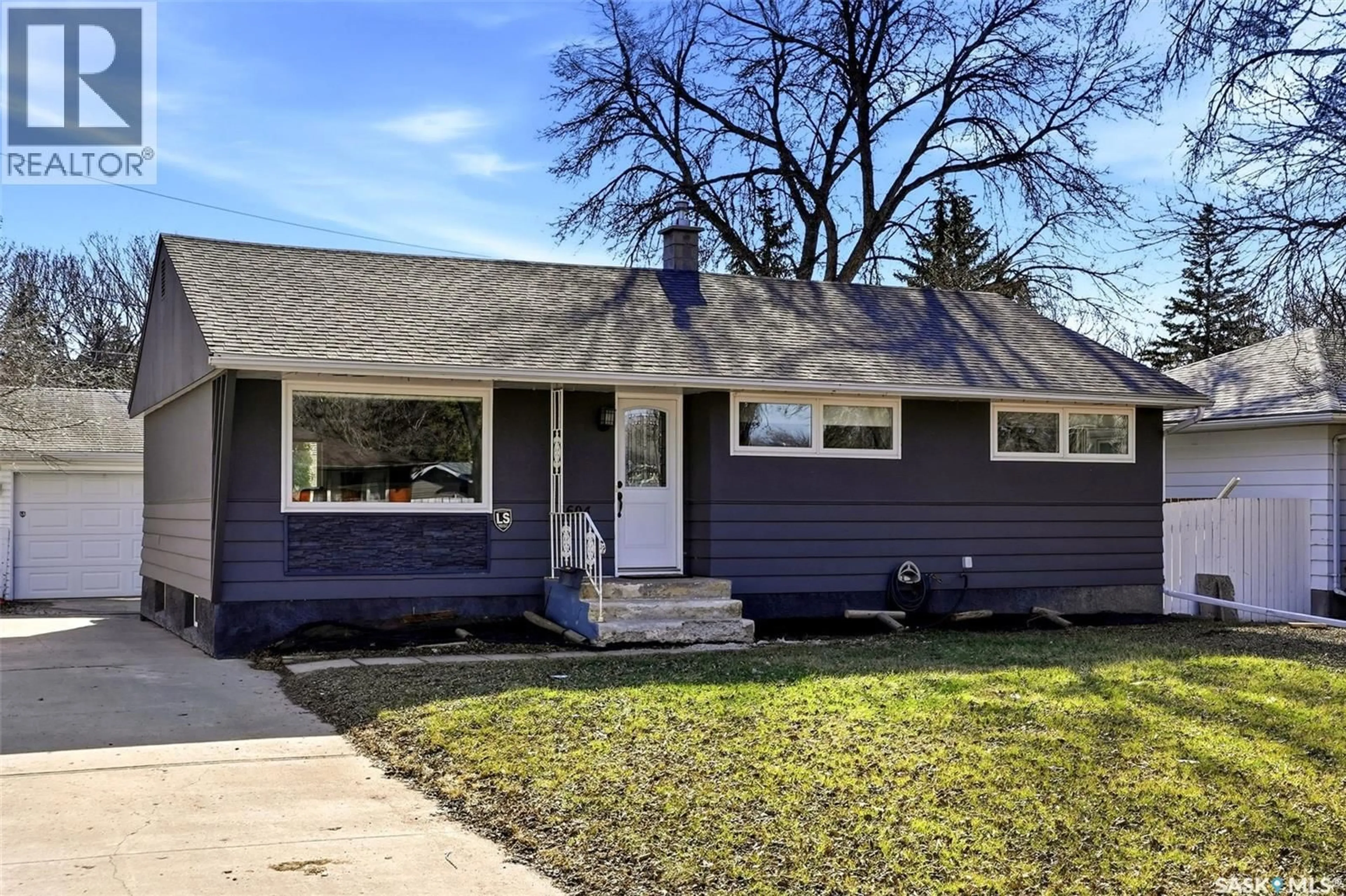 Home with vinyl exterior material, street for 4604 ELGIN ROAD, Regina Saskatchewan S4S4K6