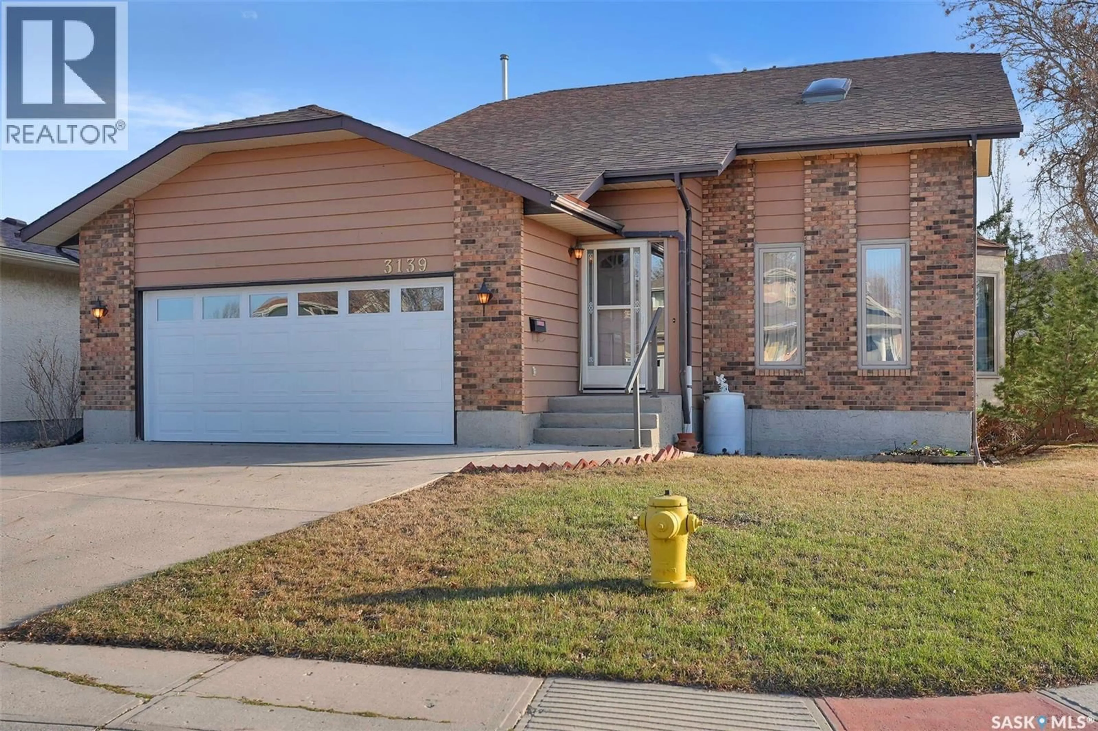 Home with brick exterior material, street for E - 3139 THACKER BAY, Regina Saskatchewan S4V1Z2