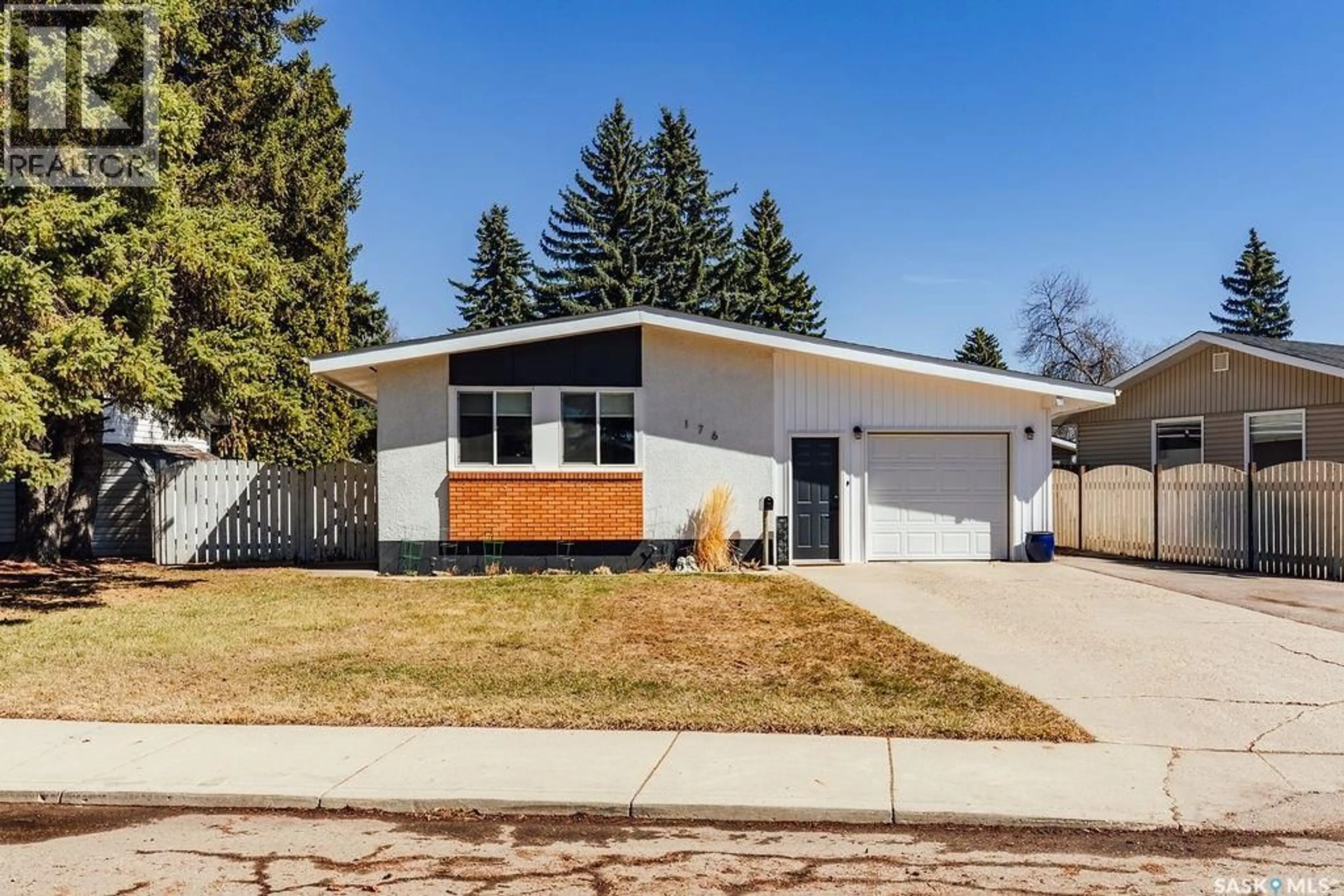 Home with vinyl exterior material, street for 176 TUCKER CRESCENT, Saskatoon Saskatchewan S7H3H9