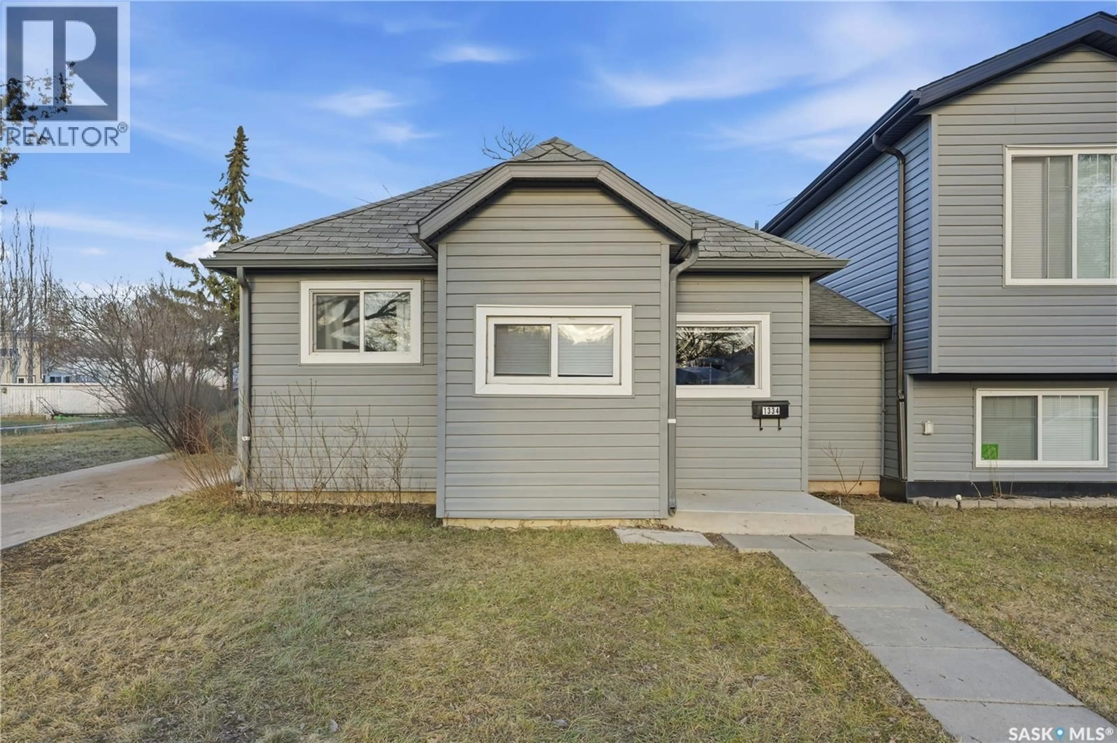 Home with vinyl exterior material, street for 1334 I AVENUE, Saskatoon Saskatchewan S7L2J3