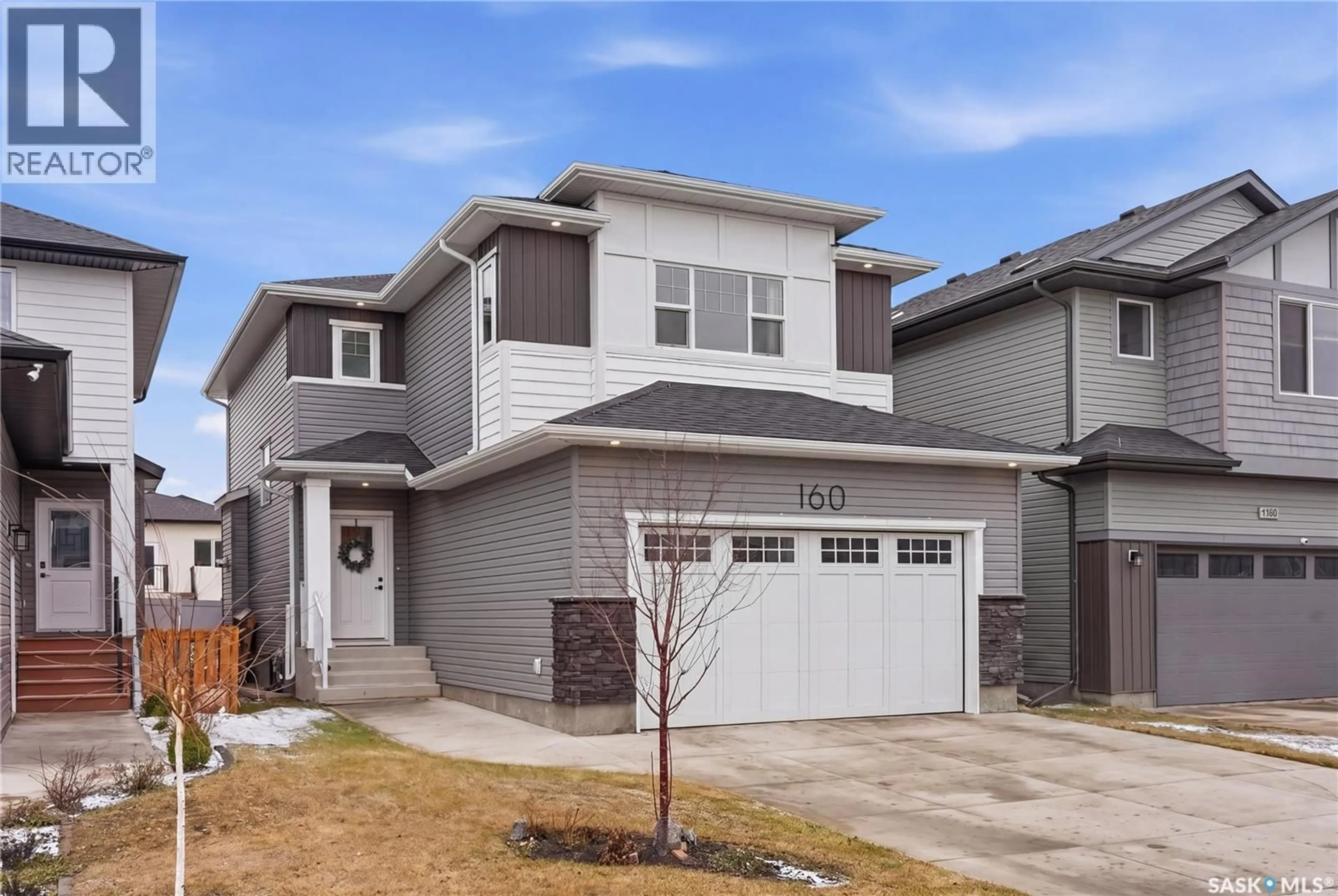 Home with brick exterior material, street for 160 THAKUR STREET, Saskatoon Saskatchewan S7W1C4