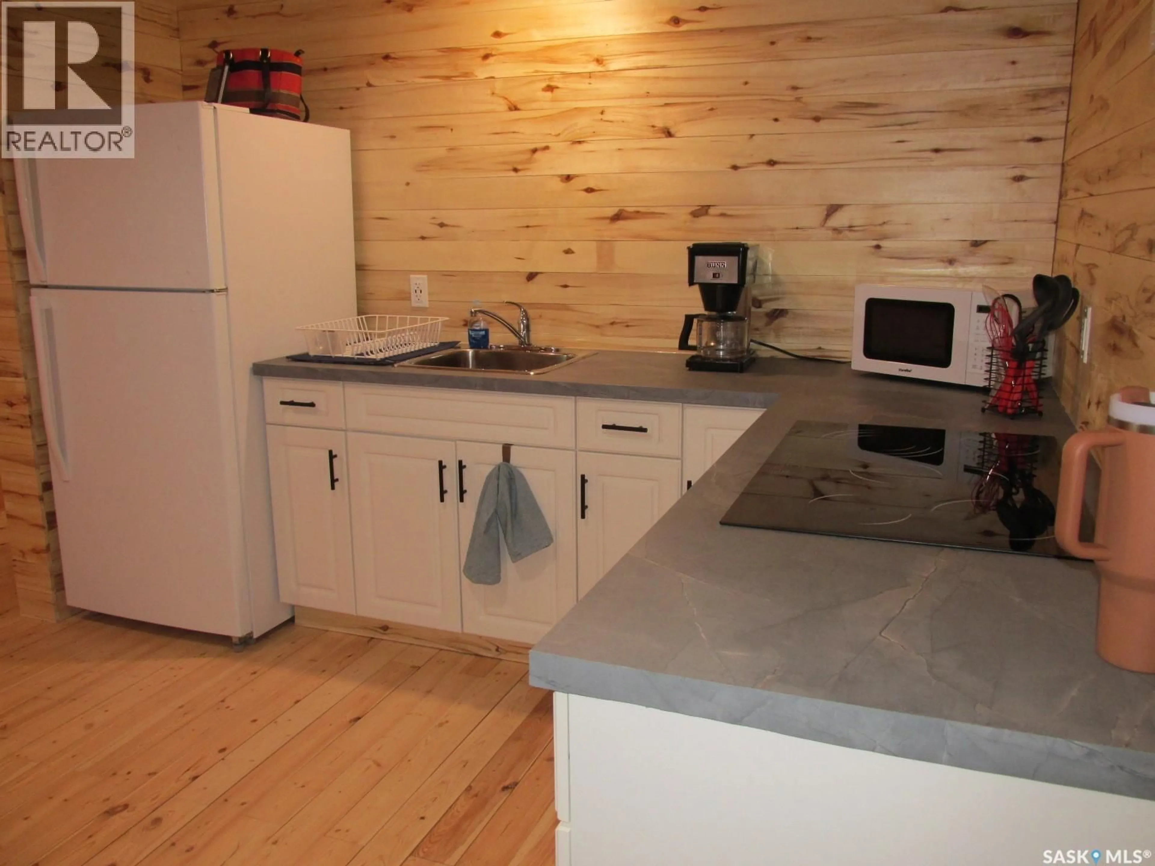 Standard kitchen, wood/laminate floor for 109 RUSTAD AVENUE, White Fox Saskatchewan S0J3B0