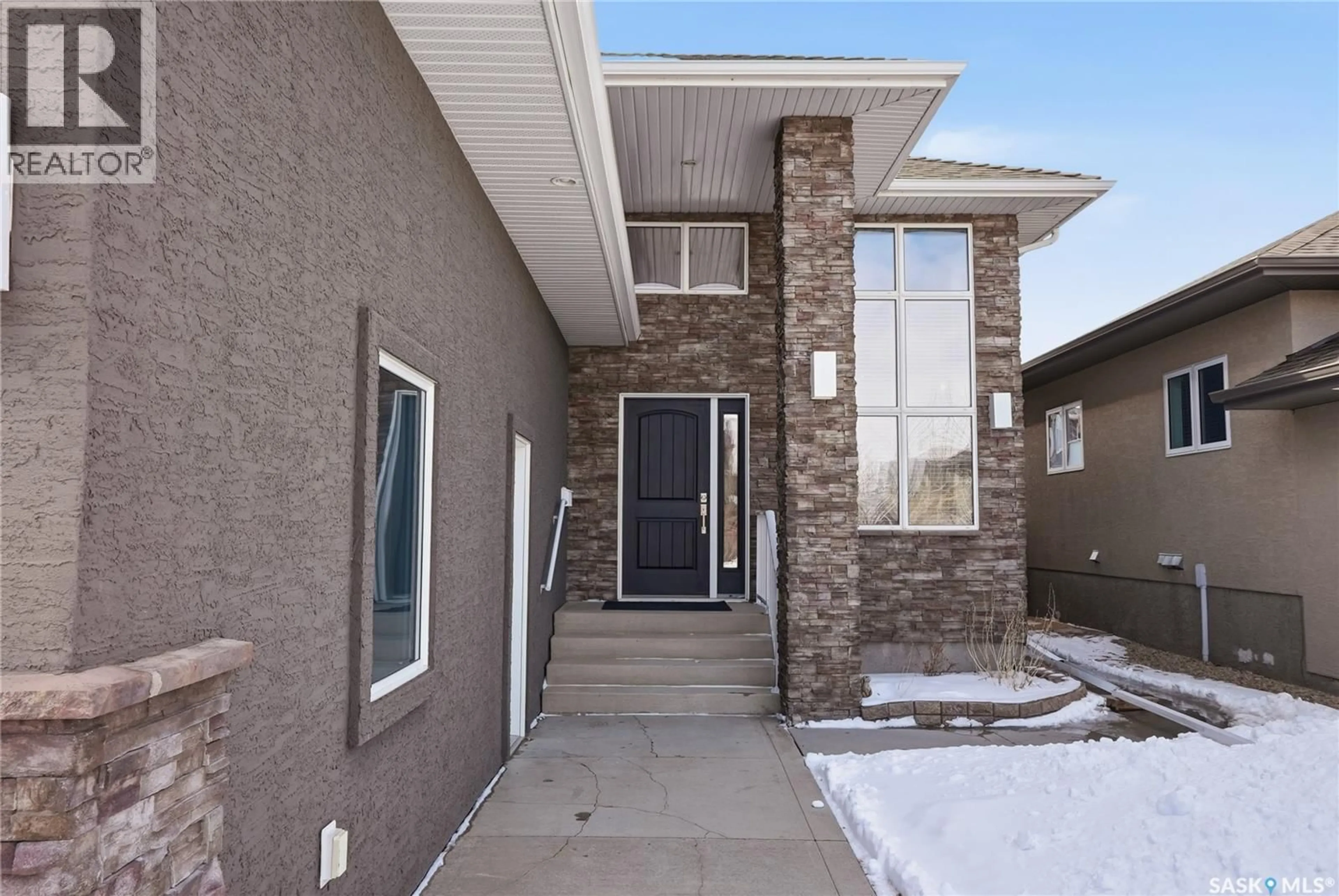 Home with brick exterior material, street for 1807 POHORECKY CRESCENT, Saskatoon Saskatchewan S7W0J2