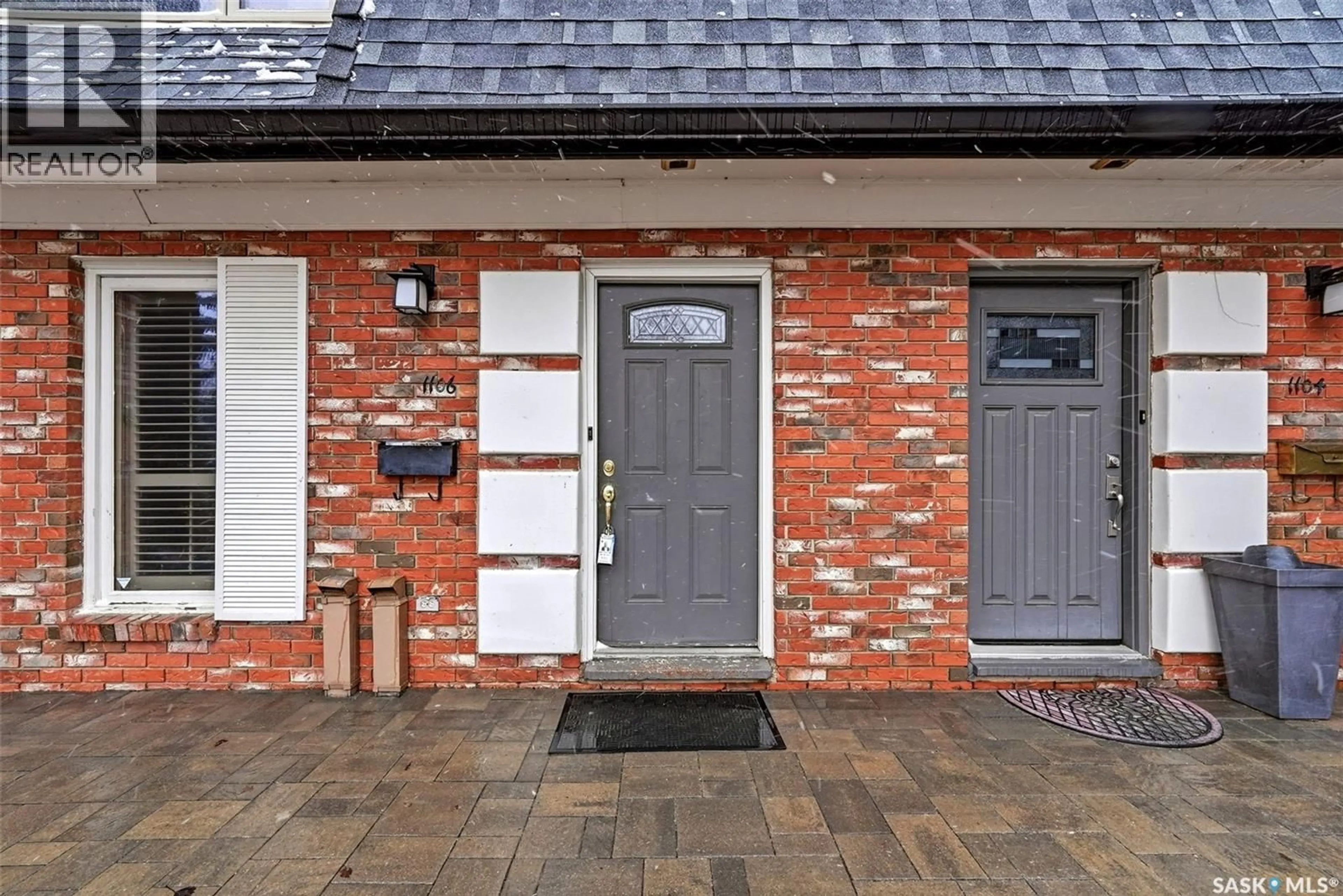 Home with brick exterior material, street for 1106 GRYPHONS WALK, Regina Saskatchewan S4S6X1