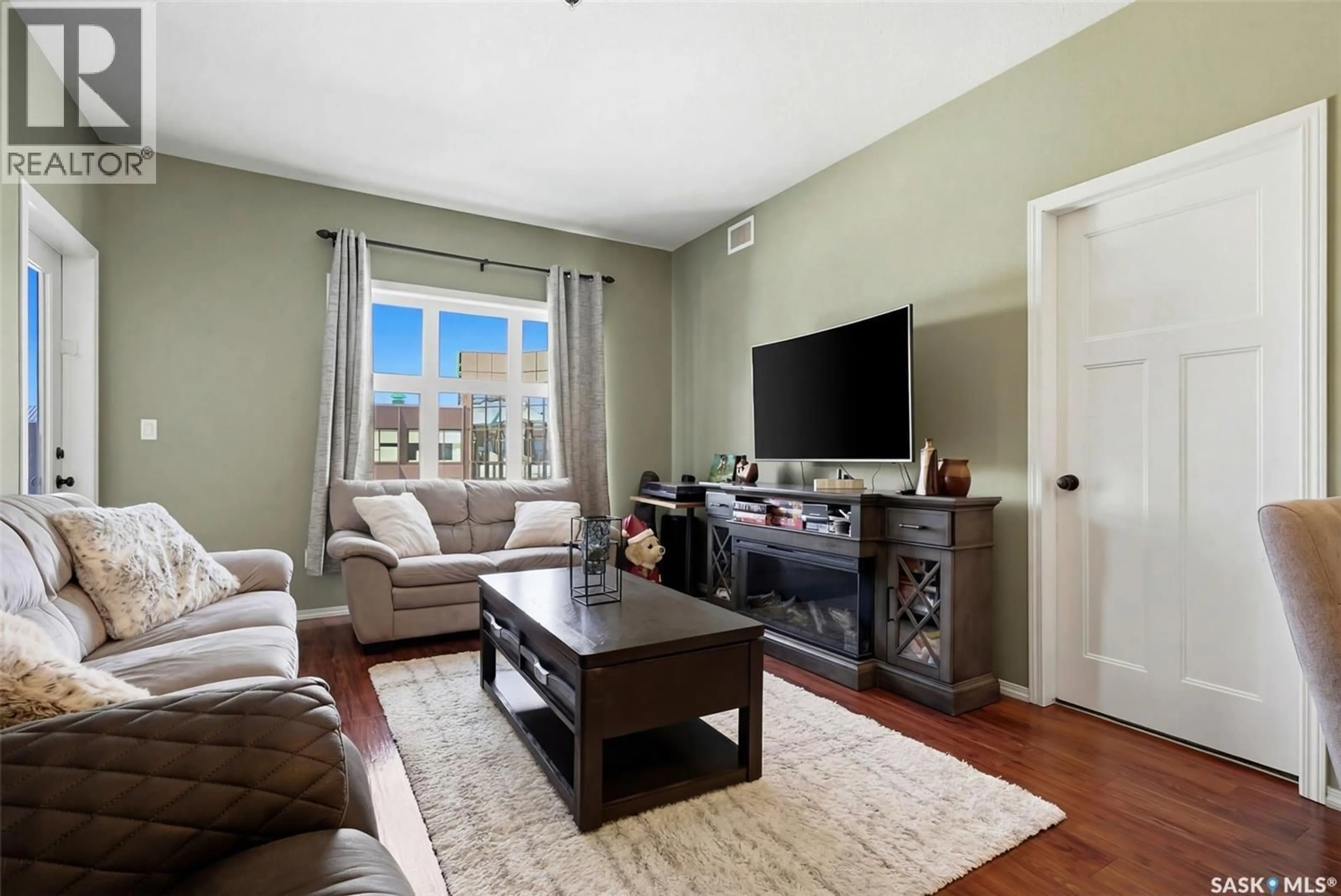 Living room with furniture, unknown for 305 - 1220 BLACKFOOT DRIVE, Regina Saskatchewan S4S6T2