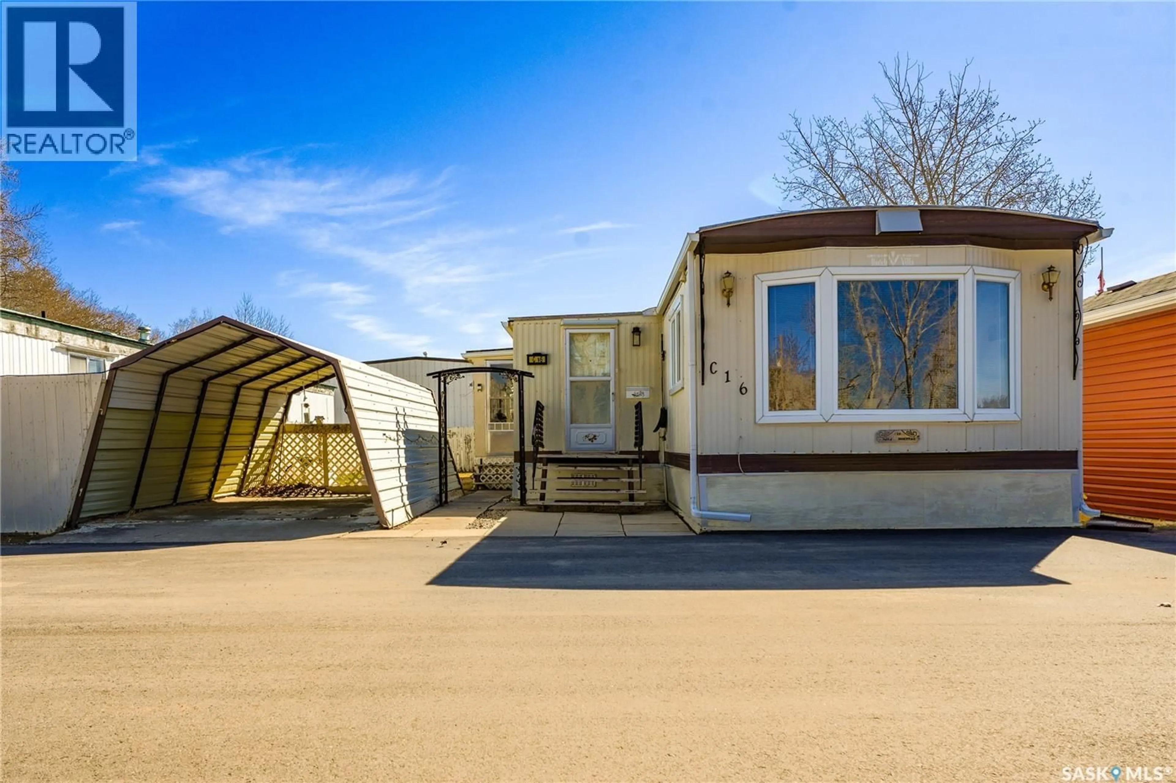 Home with vinyl exterior material, street for NE - 1455 C16 9TH AVENUE, Moose Jaw Saskatchewan S6J0A9