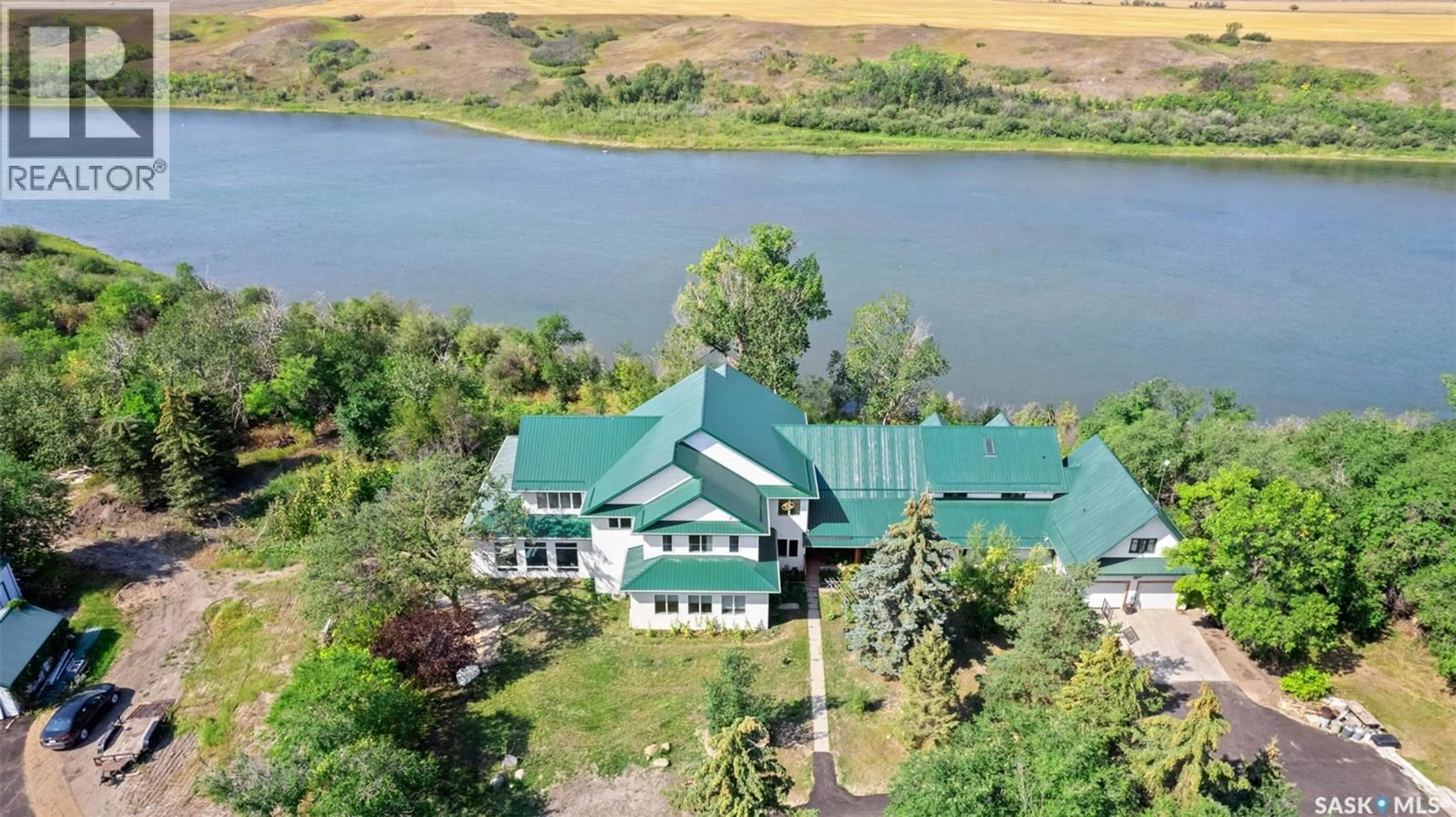 A pic from outside/outdoor area/front of a property/back of a property/a pic from drone, water/lake/river/ocean view for CAO RESIDENCE, Corman Park Rm No. 344 Saskatchewan S7K3J9