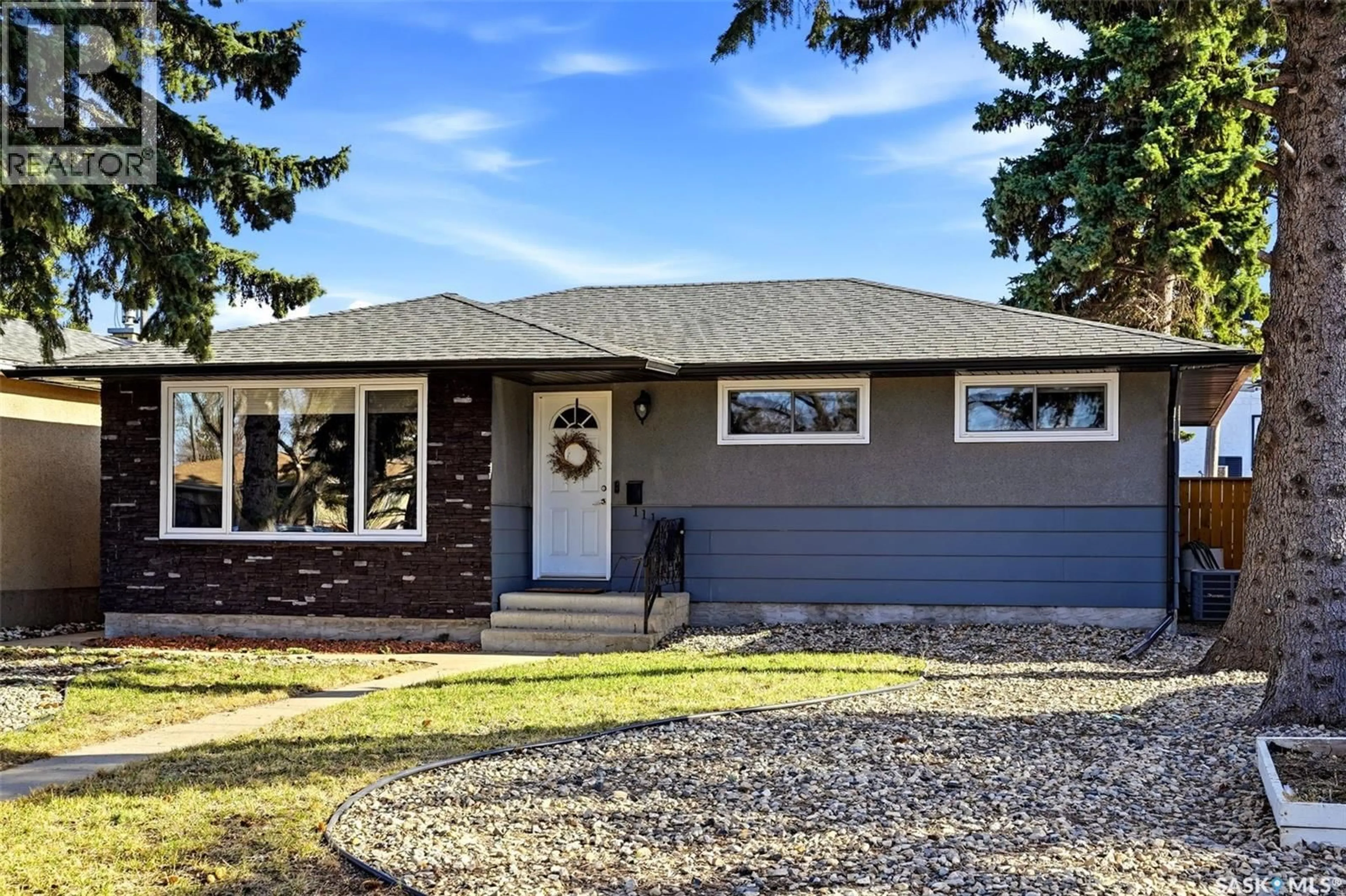 Home with vinyl exterior material, street for 1115 12TH AVENUE, Regina Saskatchewan S4N4W2