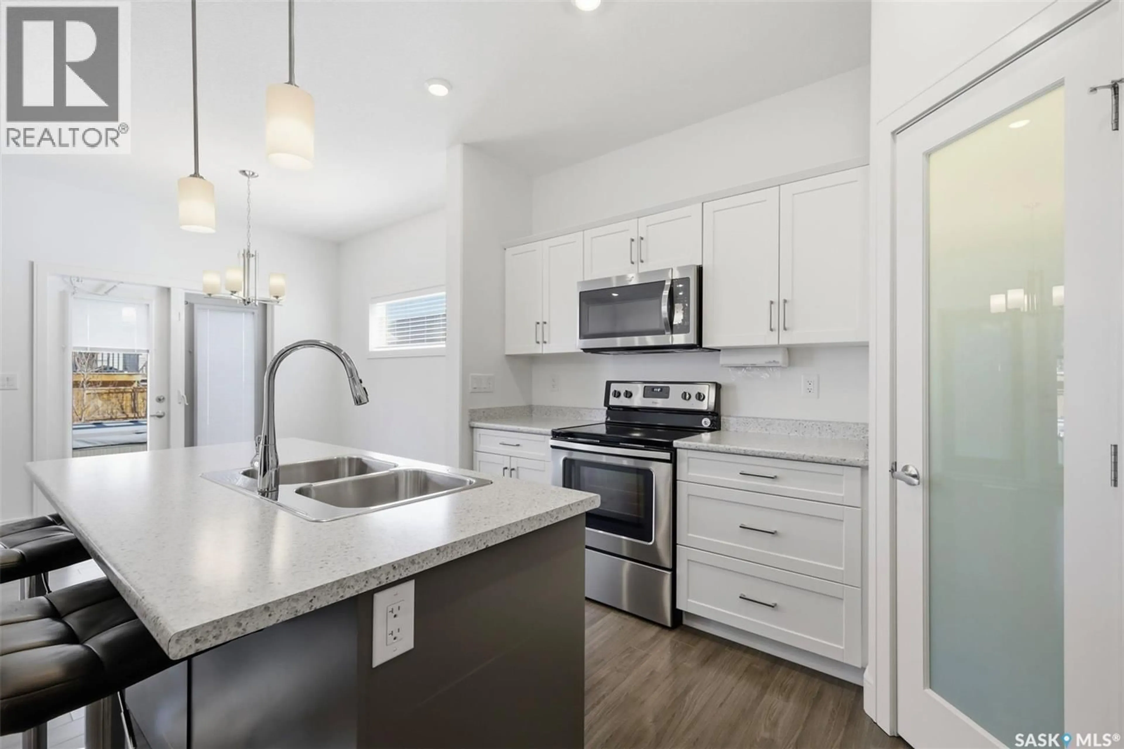 Open concept kitchen, unknown for 611 KOLYNCHUK COURT, Saskatoon Saskatchewan S7T0W4