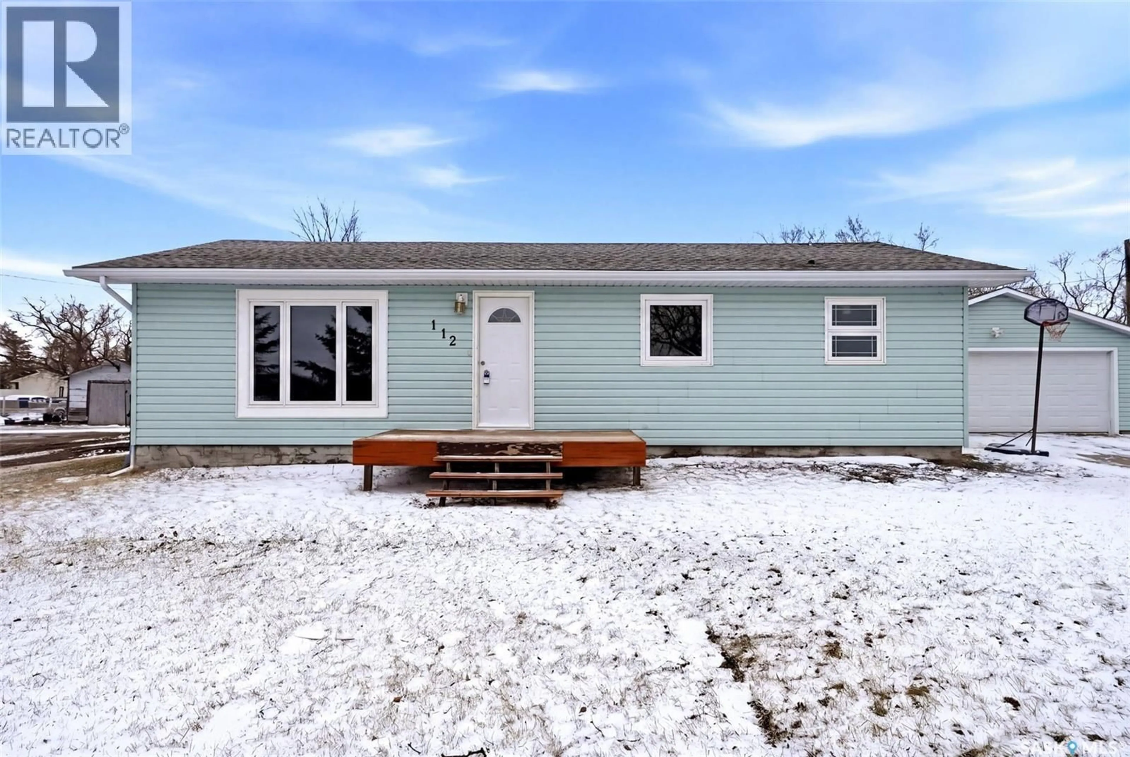 Home with vinyl exterior material, street for 112 1ST AVENUE, Edenwold Saskatchewan S0G1K0