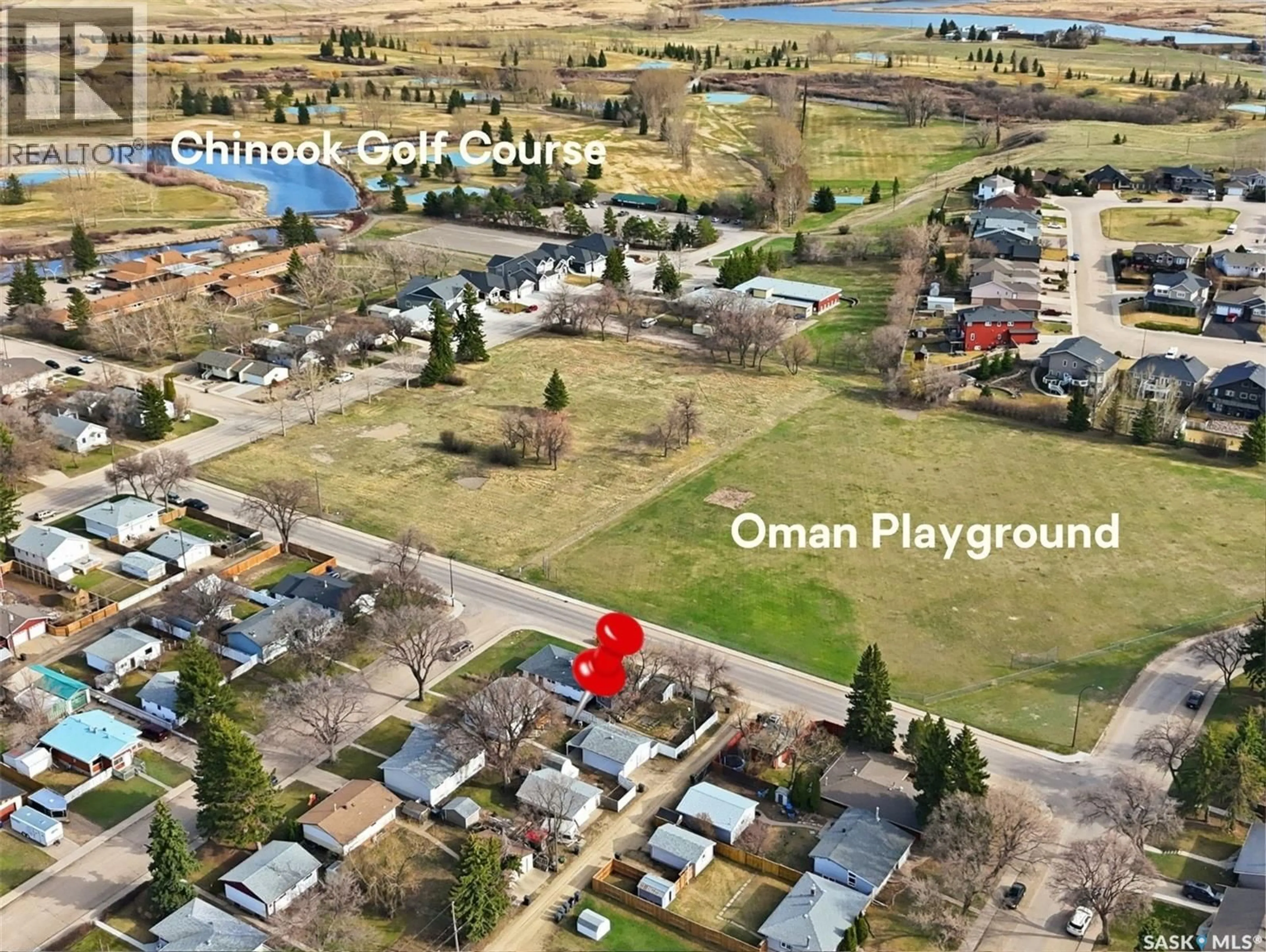 A pic from outside/outdoor area/front of a property/back of a property/a pic from drone, water/lake/river/ocean view for 444 5TH AVENUE, Swift Current Saskatchewan S9H3N4