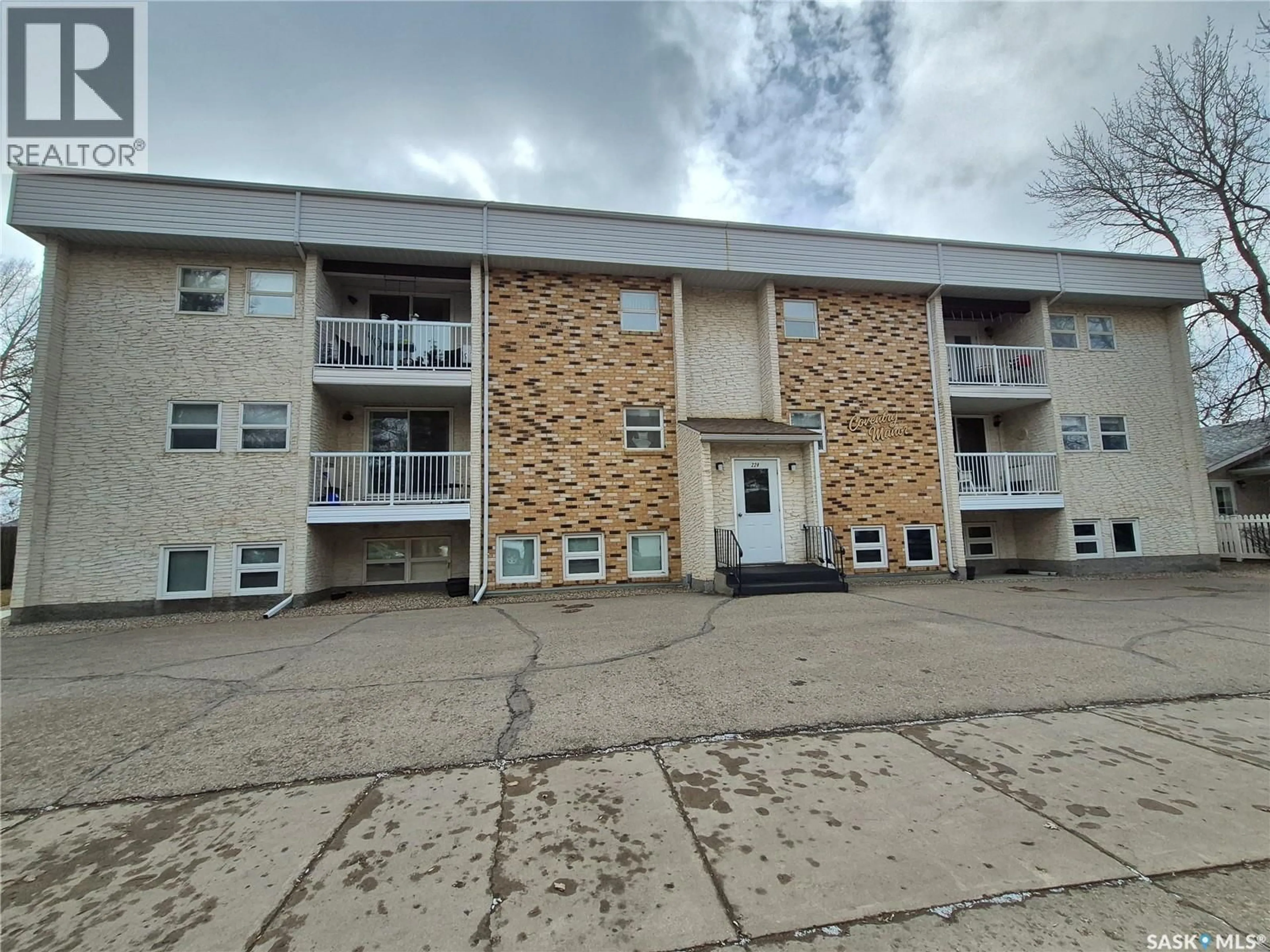 A pic from outside/outdoor area/front of a property/back of a property/a pic from drone, building for 24 228 3RD STREET, Weyburn Saskatchewan S4H0W6