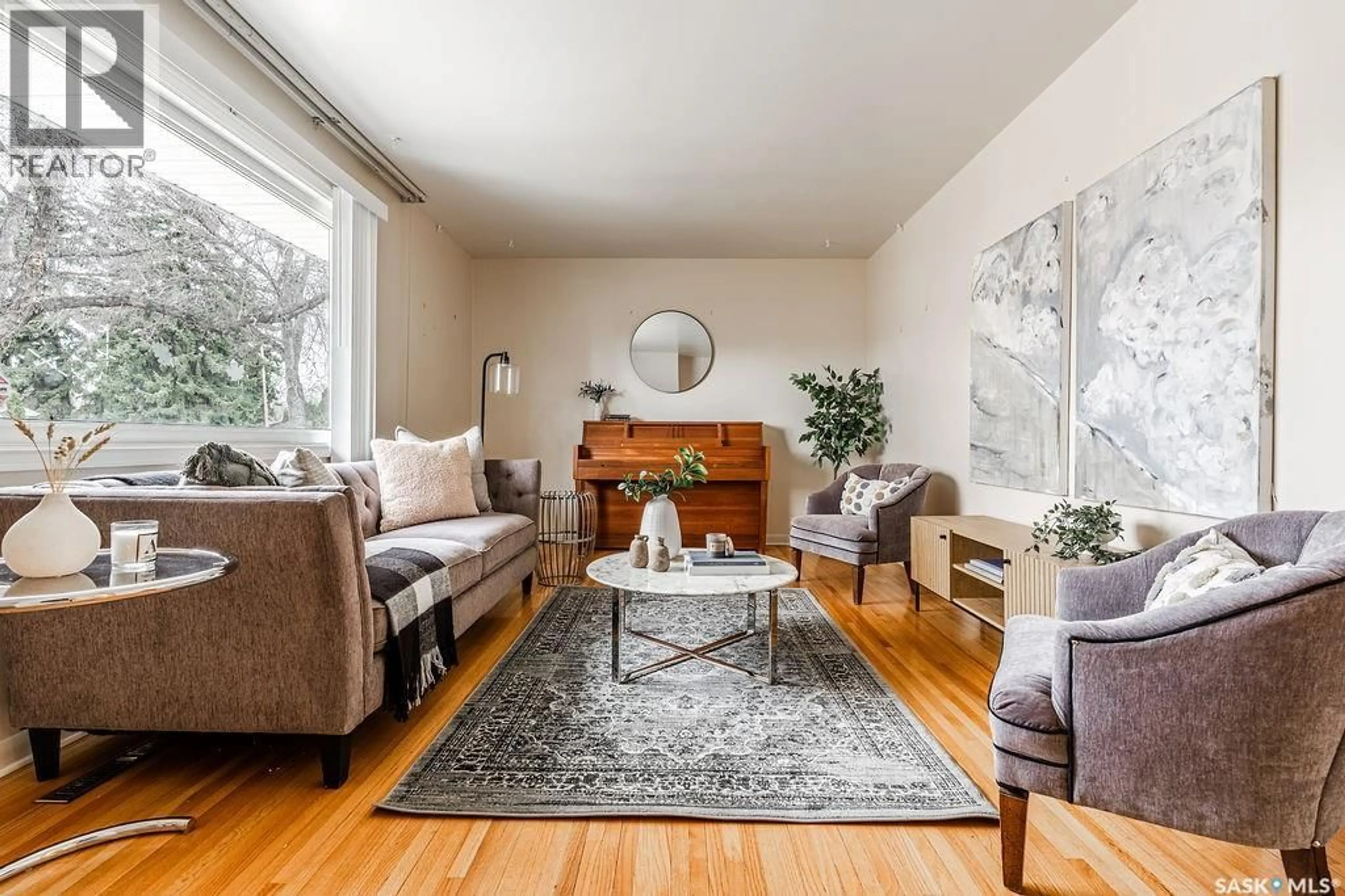 Living room with furniture, wood/laminate floor for 1609 PARK AVENUE, Saskatoon Saskatchewan S7H2P2