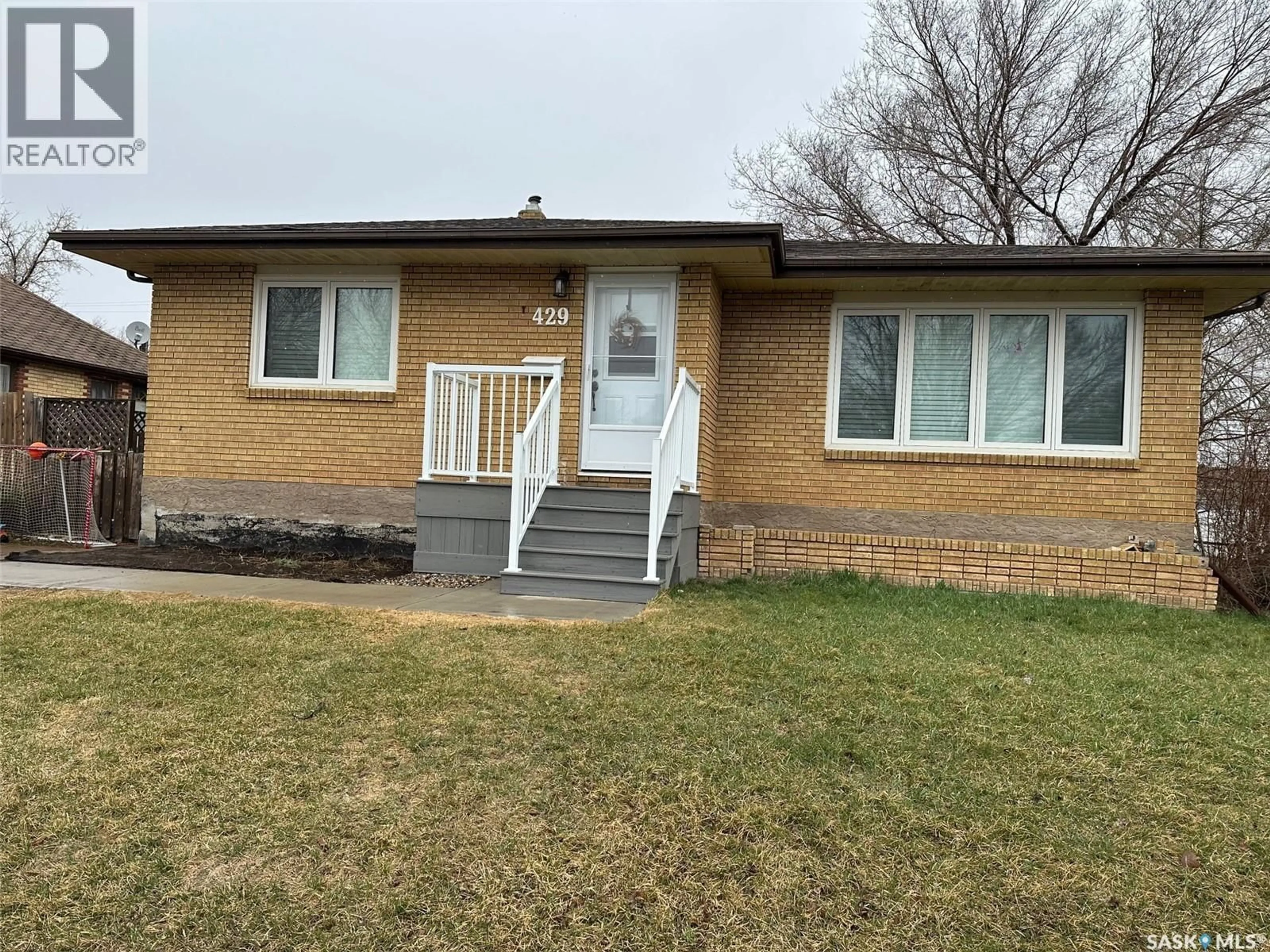 Home with brick exterior material, street for 429 THIRD STREET, Estevan Saskatchewan S4A0P1