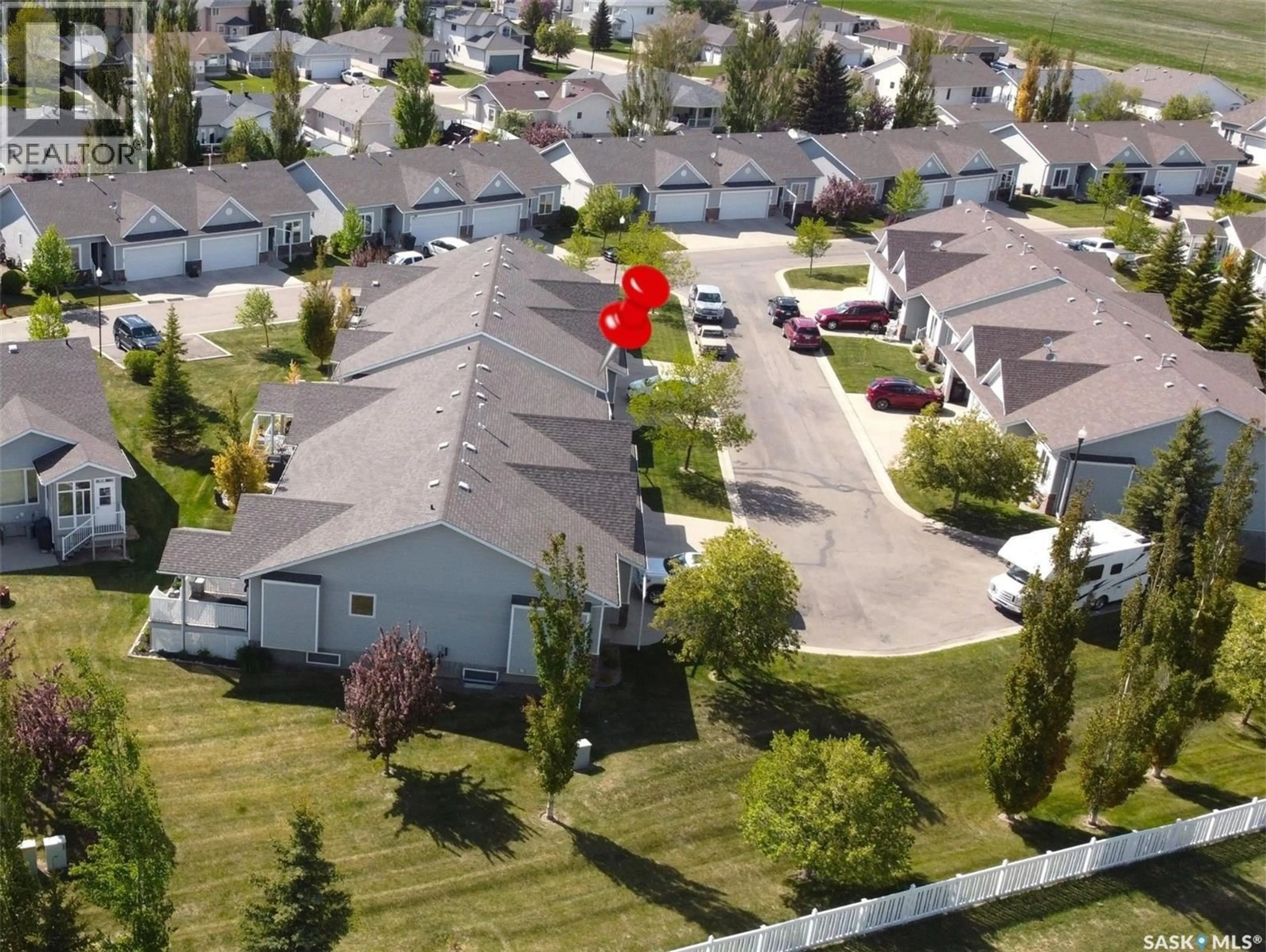 A pic from outside/outdoor area/front of a property/back of a property/a pic from drone, street for 500 - 22 BATTLEFORD TRAIL, Swift Current Saskatchewan S9H5M7