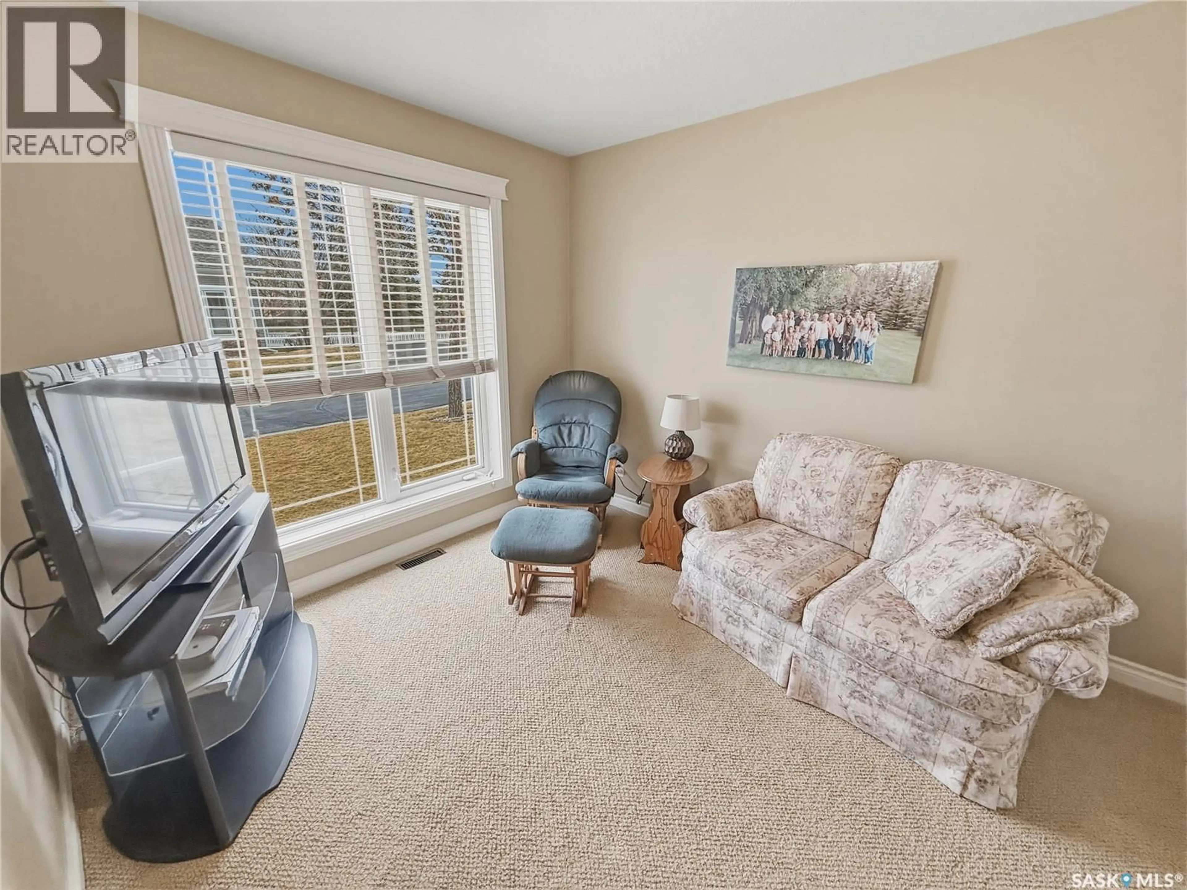 Living room with furniture, carpet floor for 500 - 22 BATTLEFORD TRAIL, Swift Current Saskatchewan S9H5M7