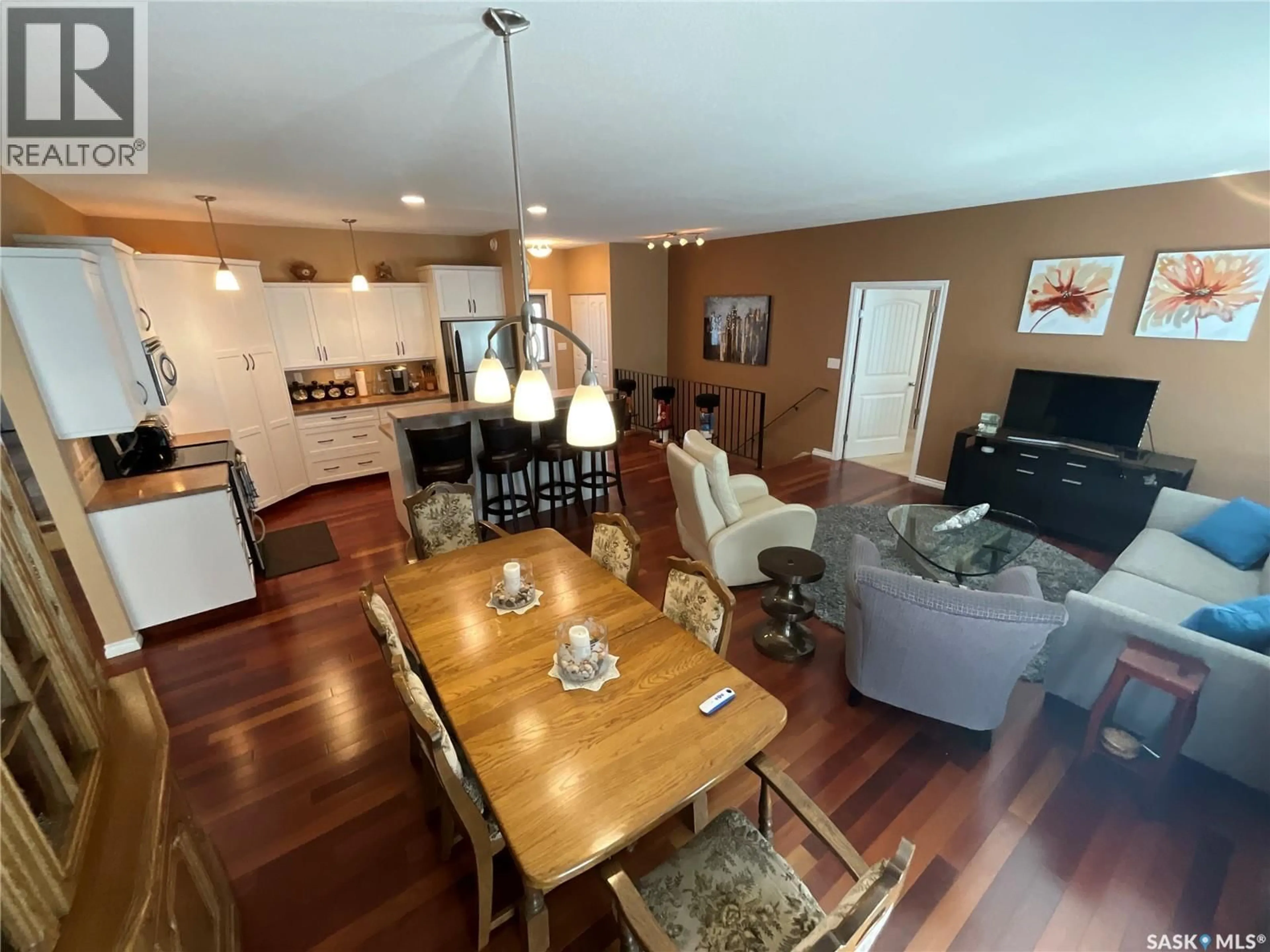 Open concept kitchen, wood/laminate floor for 15 - 1590 4TH AVENUE, Moose Jaw Saskatchewan S6J0A5