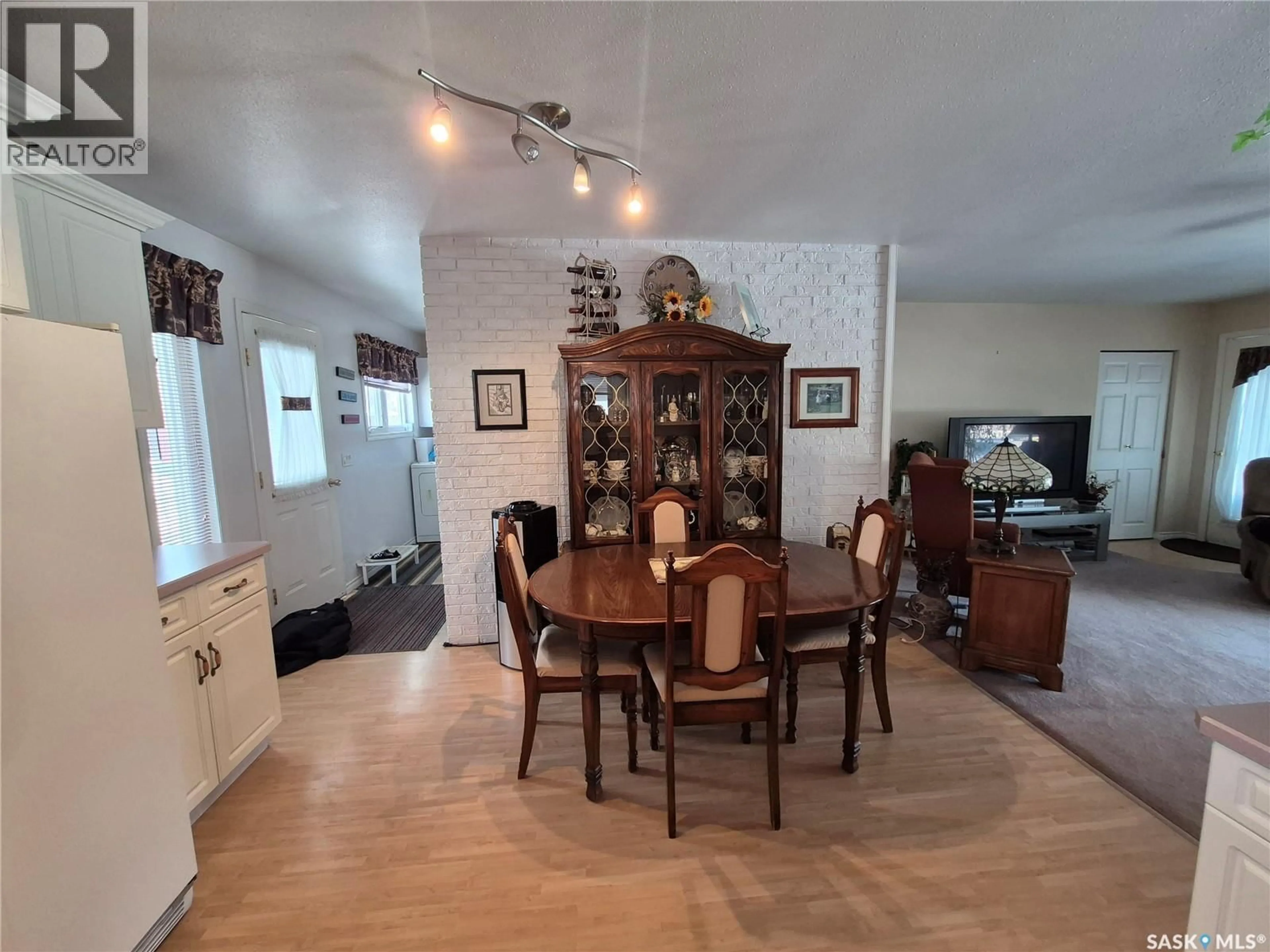 Dining room, wood/laminate floor for 317 2ND STREET, Ponteix Saskatchewan S0N1Z0