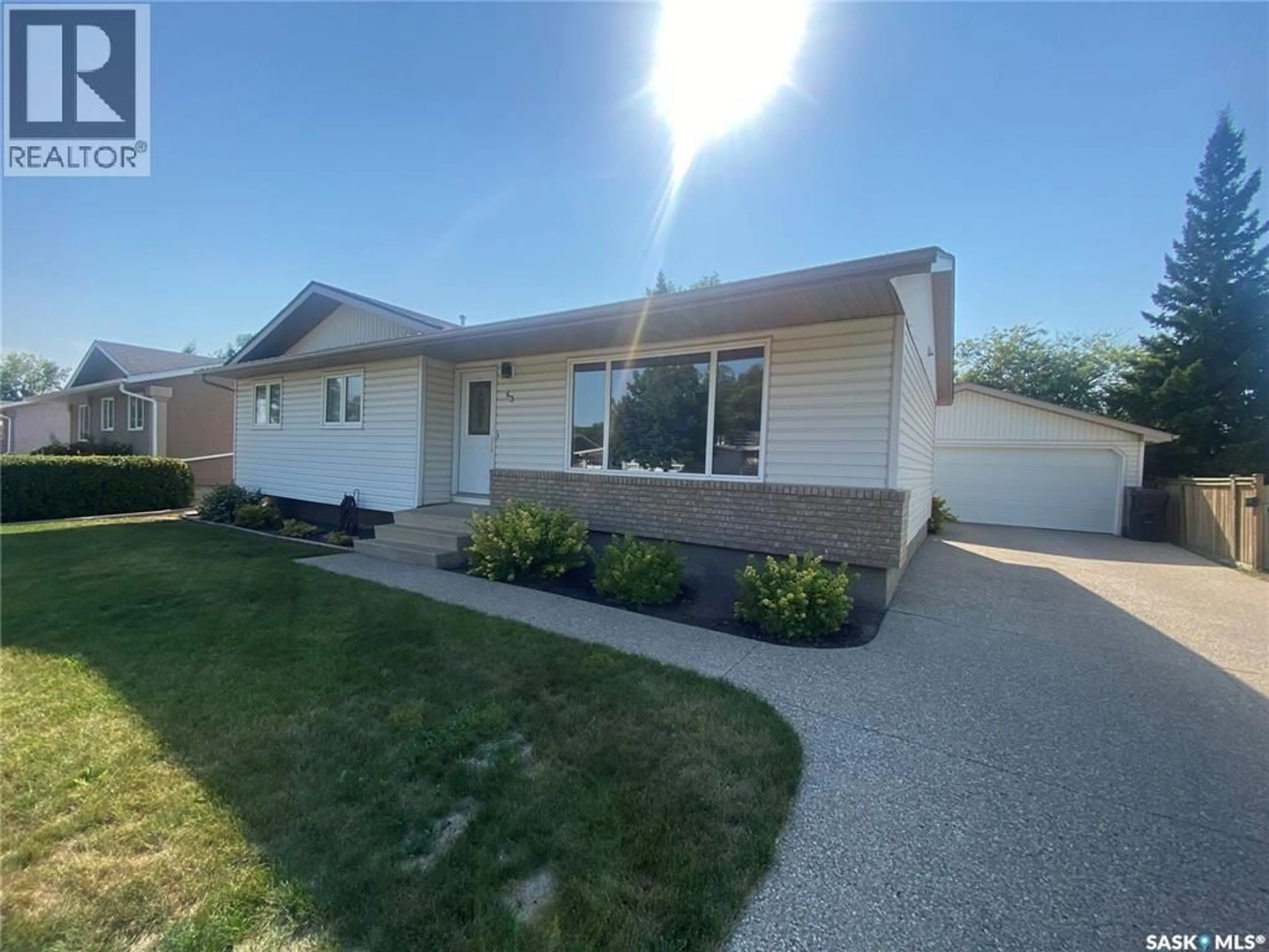 Home with vinyl exterior material, street for 63 COLLACOTT DRIVE, Yorkton Saskatchewan S3N3E5
