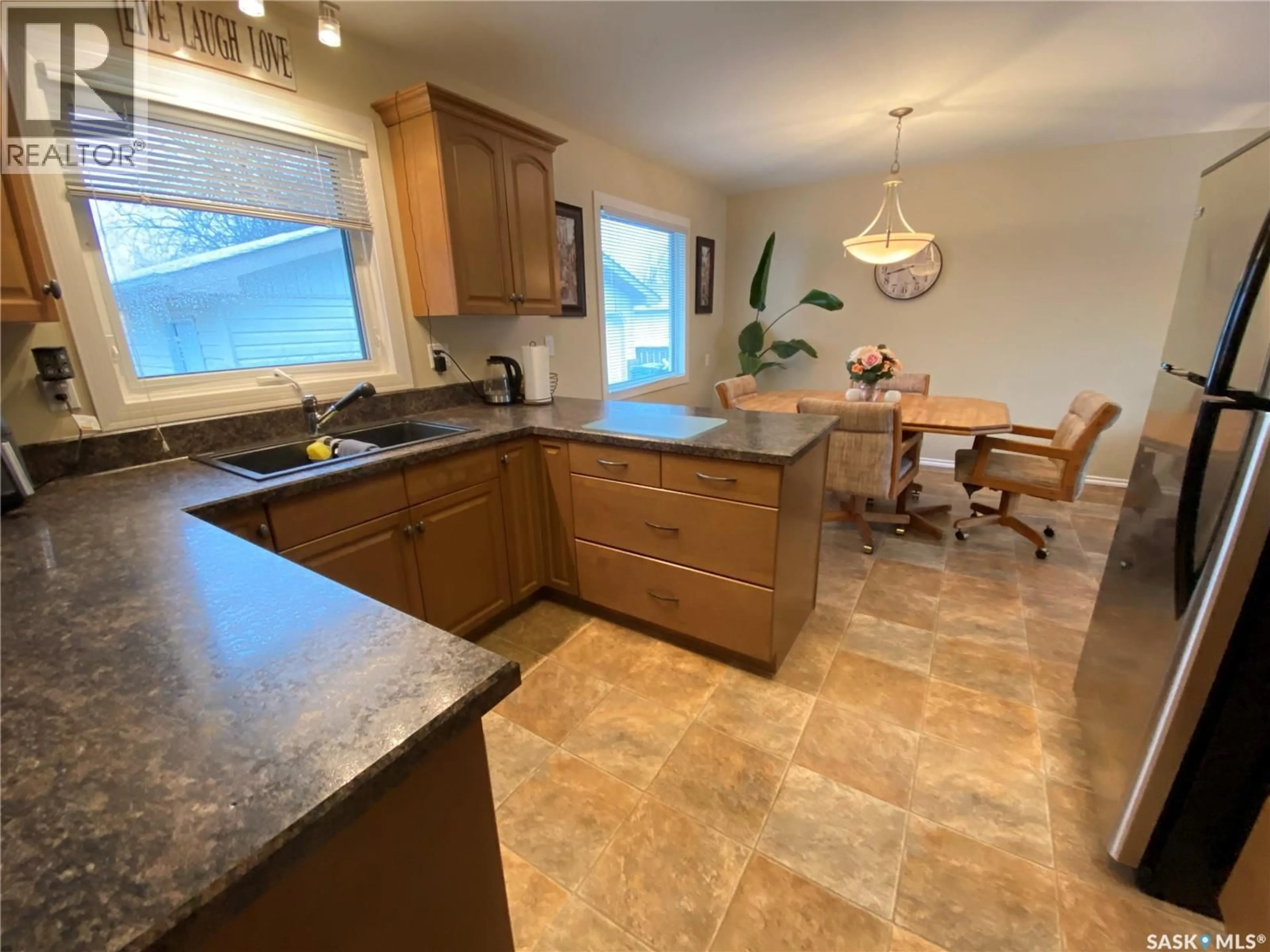 Open concept kitchen, ceramic/tile floor for 63 COLLACOTT DRIVE, Yorkton Saskatchewan S3N3E5