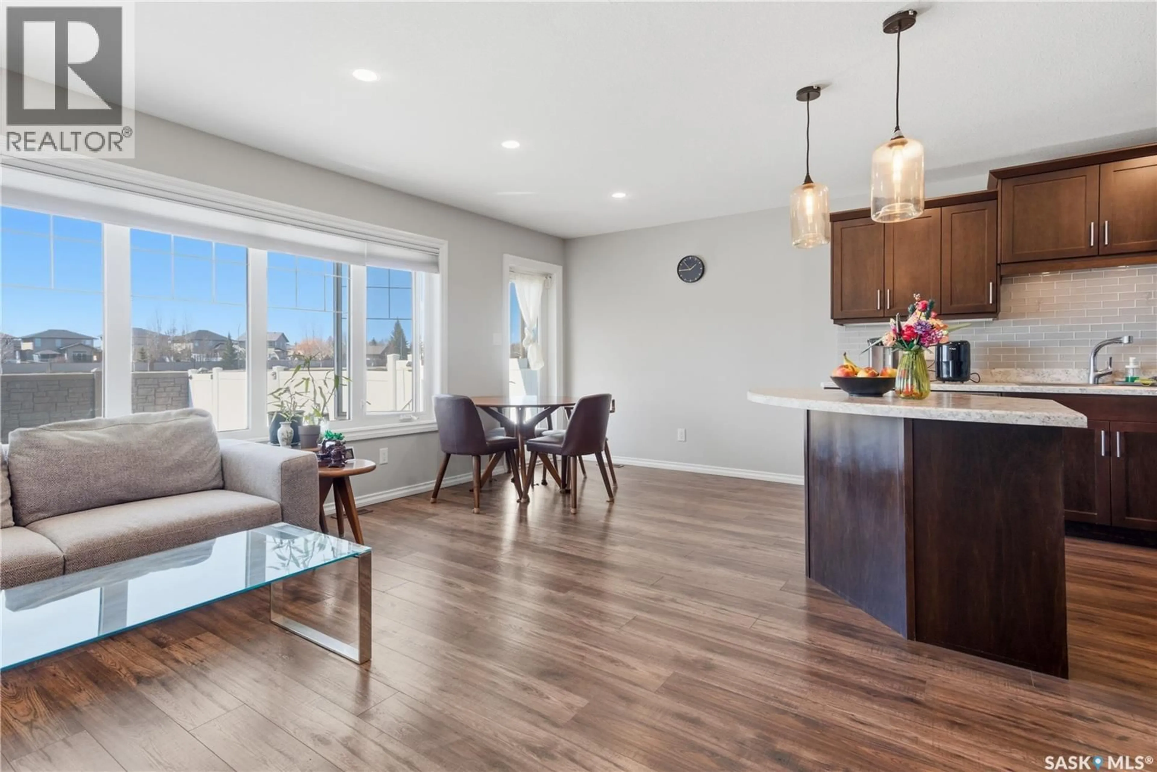 Open concept kitchen, wood/laminate floor for 4000 - 303 SANDHILL CRESCENT, Regina Saskatchewan S4V3N4