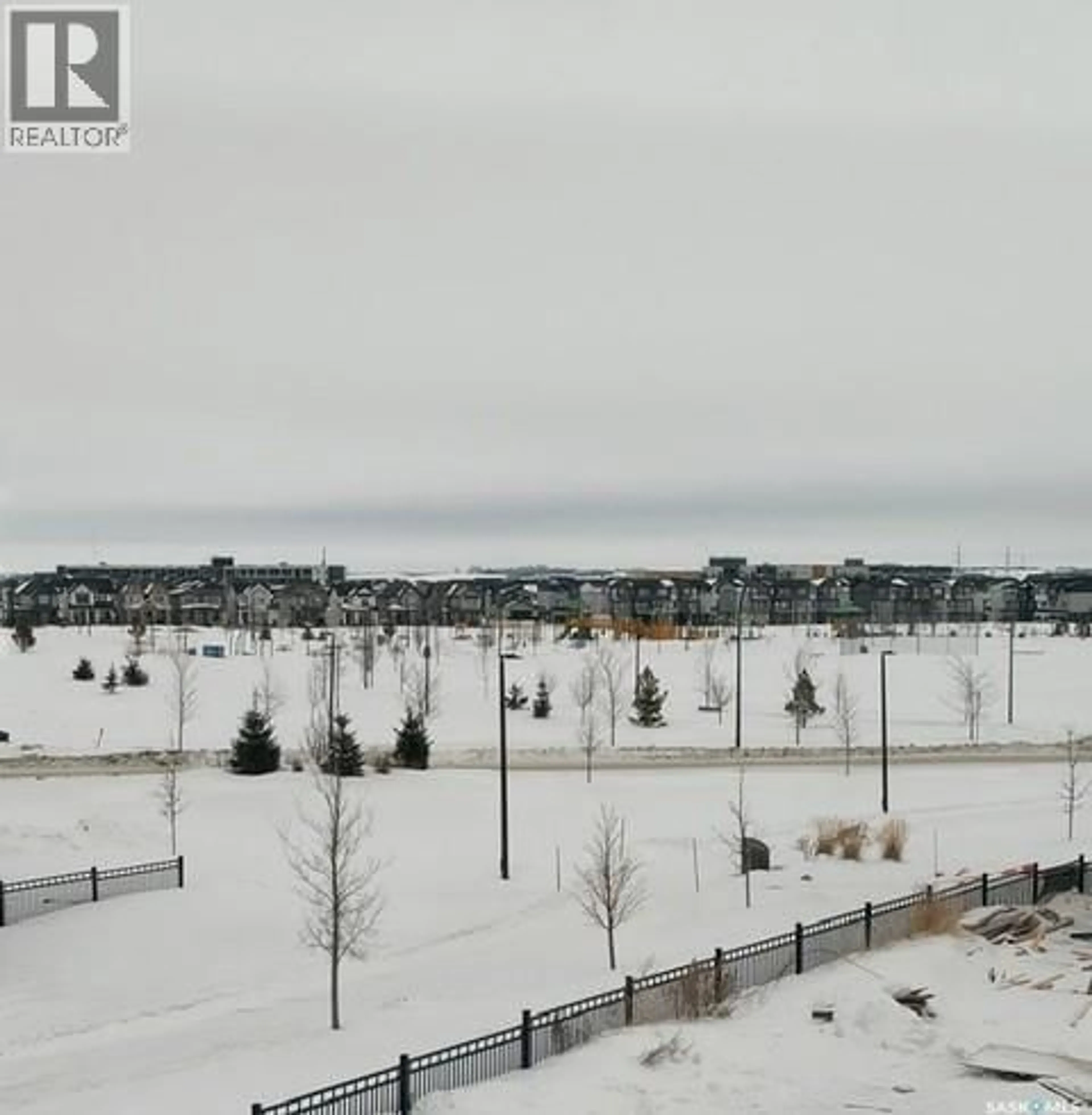 A pic from outside/outdoor area/front of a property/back of a property/a pic from drone, water/lake/river/ocean view for 351 ANISKOTAW BEND, Saskatoon Saskatchewan S7V1M1