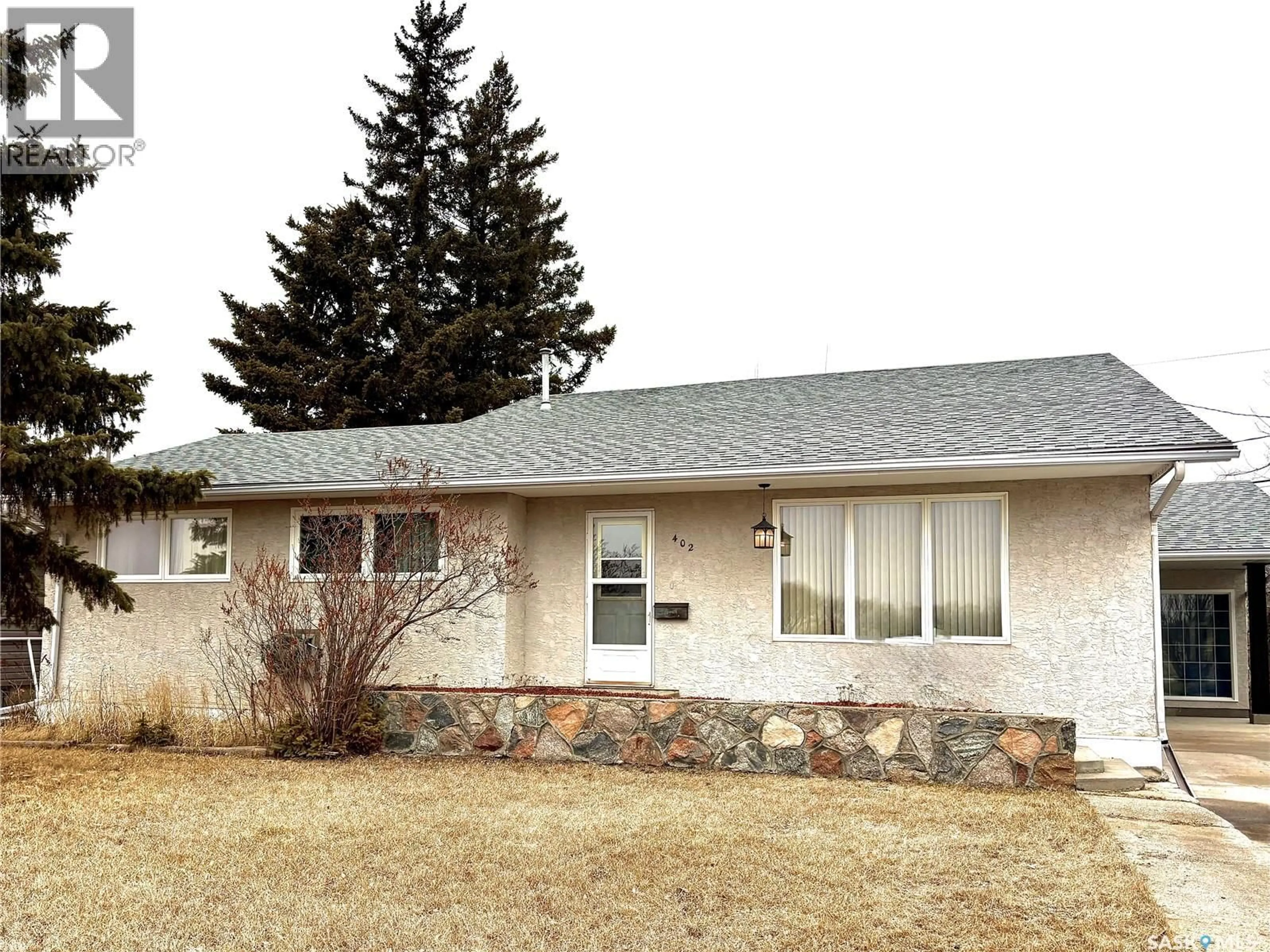 Home with vinyl exterior material, street for 402 FOURTH STREET, Kipling Saskatchewan S0G2S0
