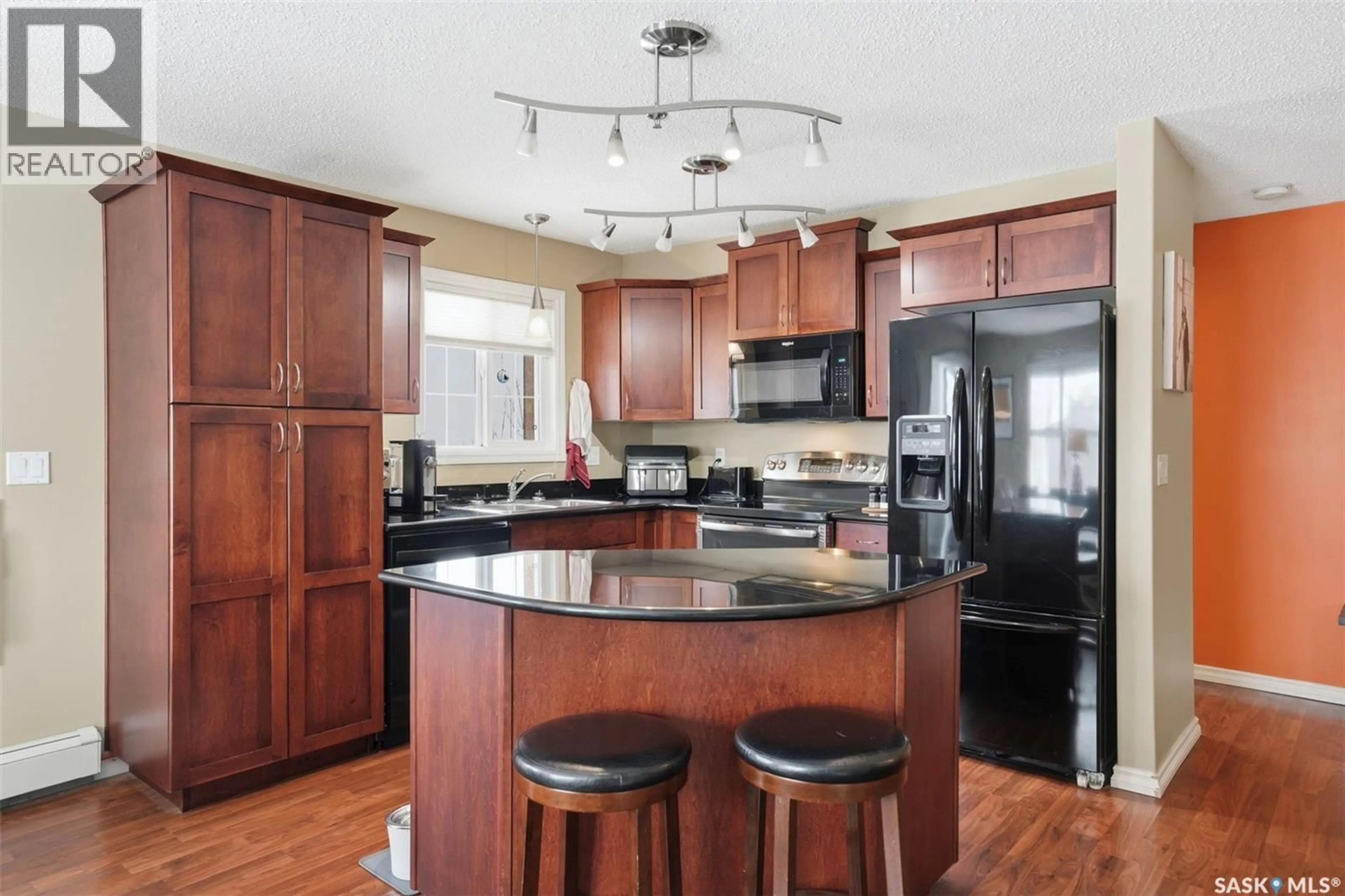 Open concept kitchen, unknown for A206 - 103 WELLMAN CRESCENT, Saskatoon Saskatchewan S7T0C1