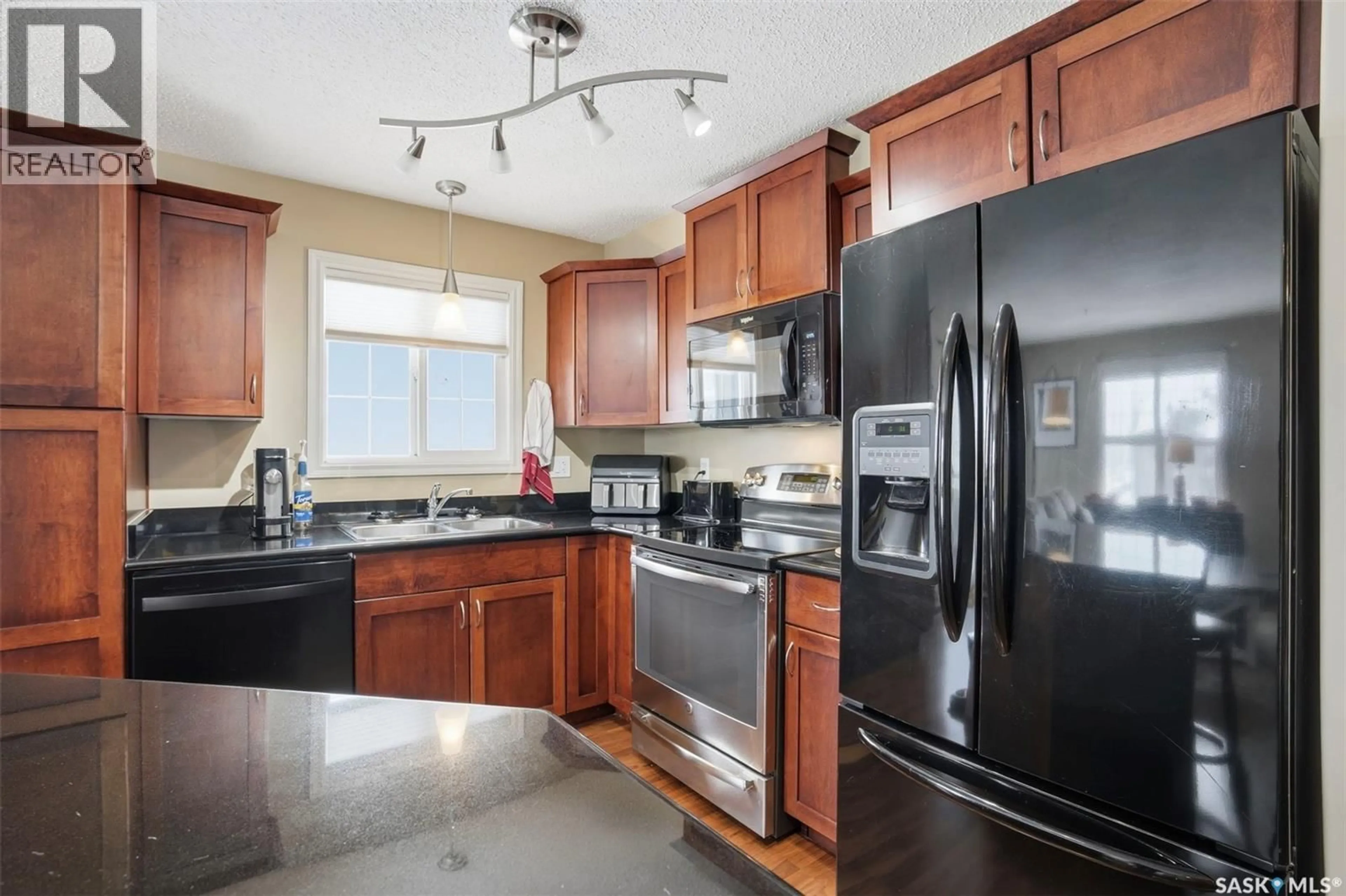 Open concept kitchen, unknown for A206 - 103 WELLMAN CRESCENT, Saskatoon Saskatchewan S7T0C1