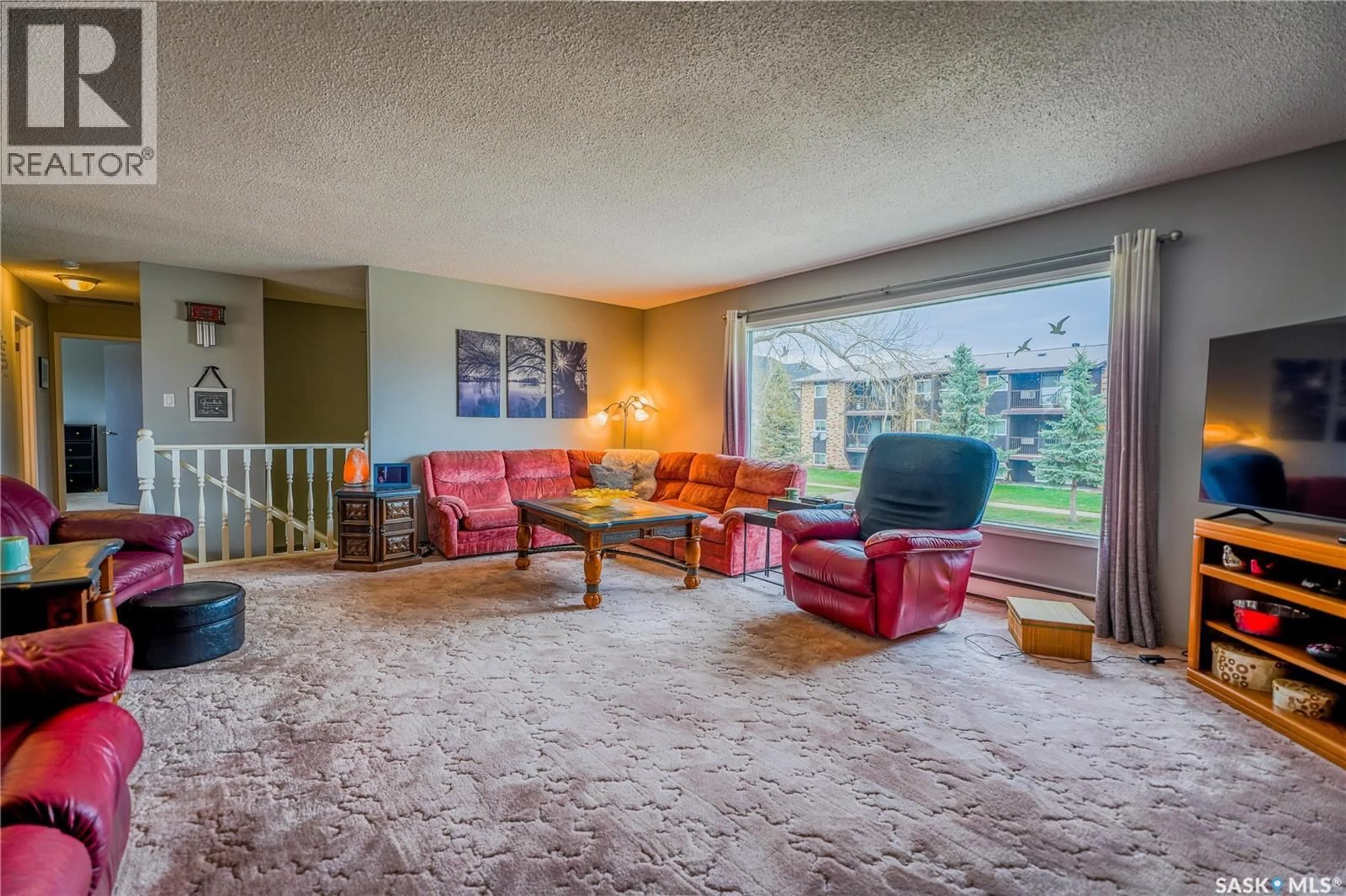Living room with furniture, carpet floor for 254 2ND AVENUE, Gravelbourg Saskatchewan S0H1X0