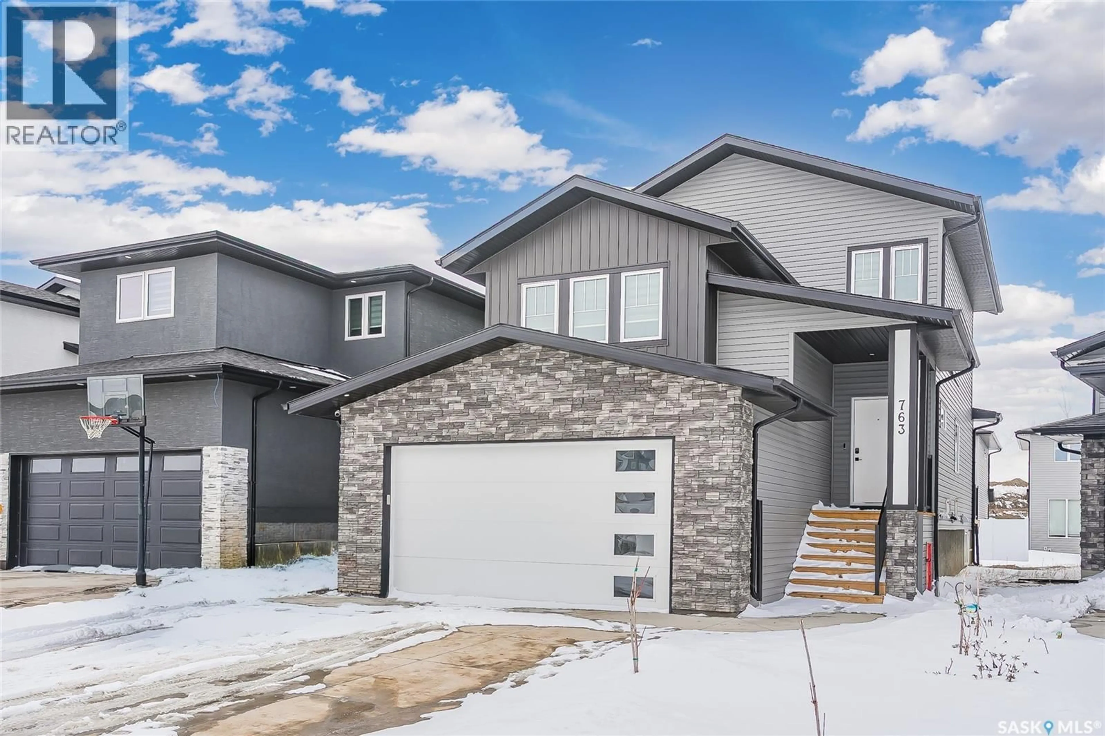 Home with brick exterior material, street for 763 DELAINEY COURT, Saskatoon Saskatchewan S7V1P9