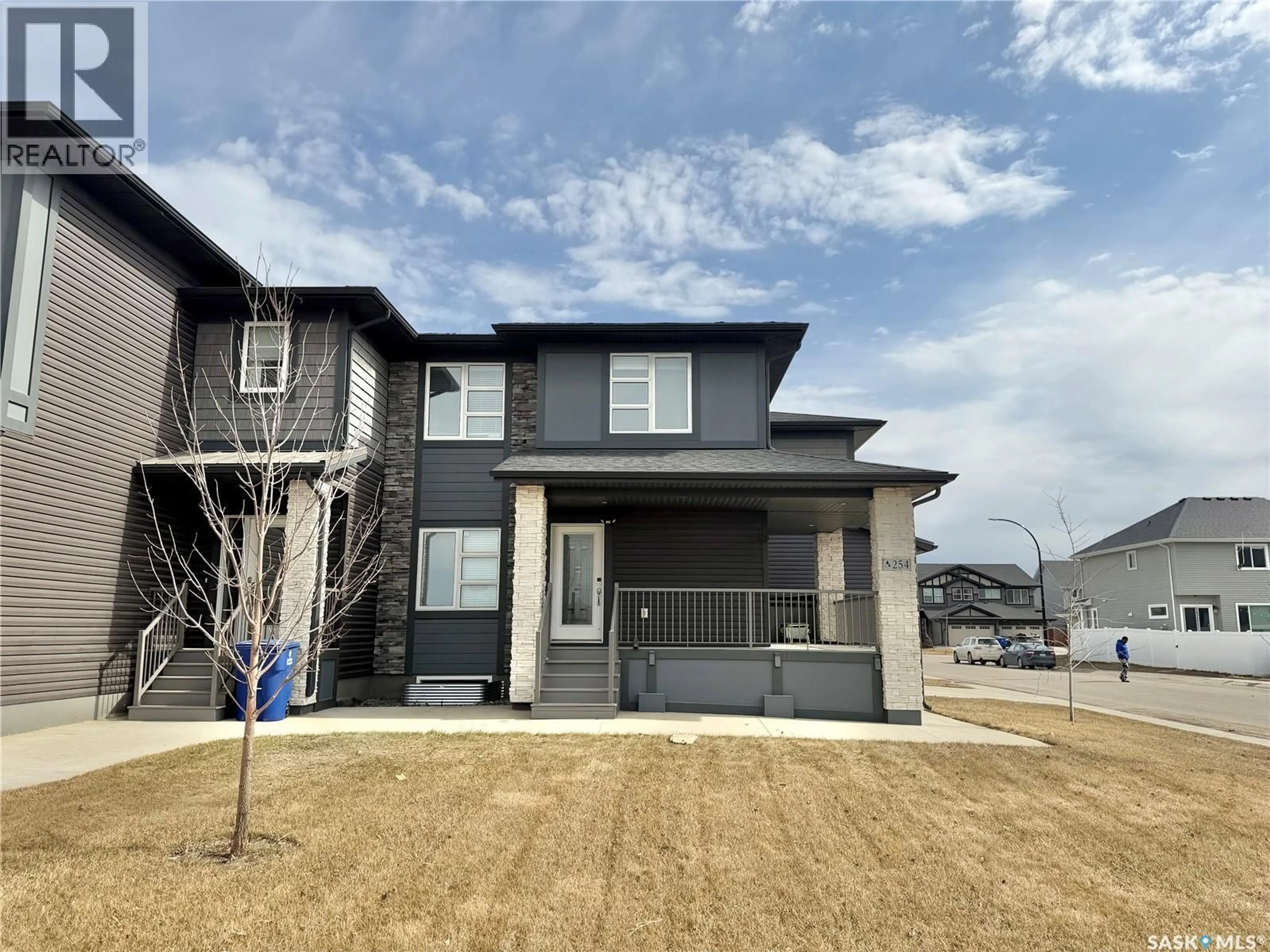 Home with brick exterior material, street for 254 BRIGHTON GATE, Saskatoon Saskatchewan S7V0R1