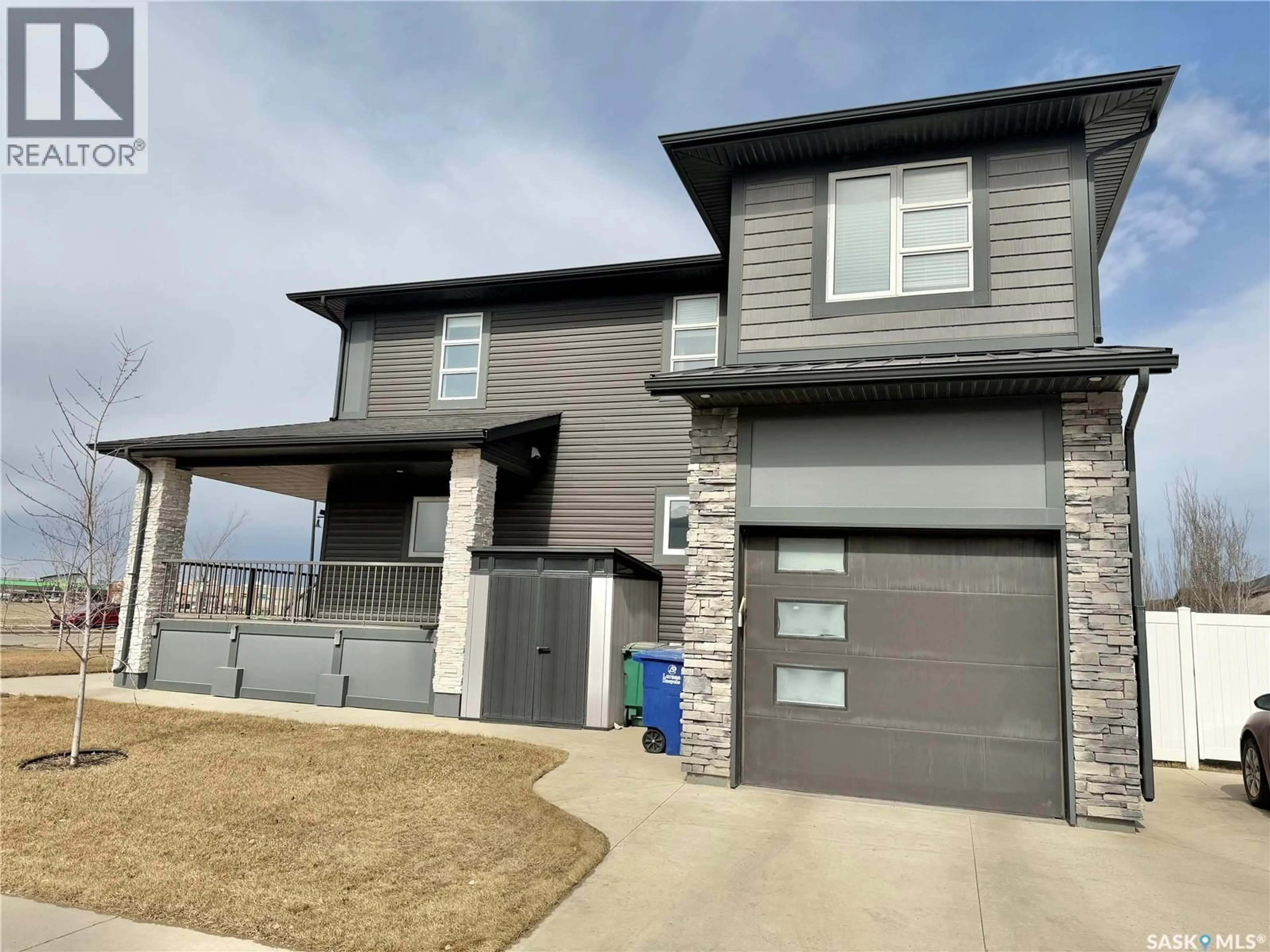 Home with brick exterior material, street for 254 BRIGHTON GATE, Saskatoon Saskatchewan S7V0R1