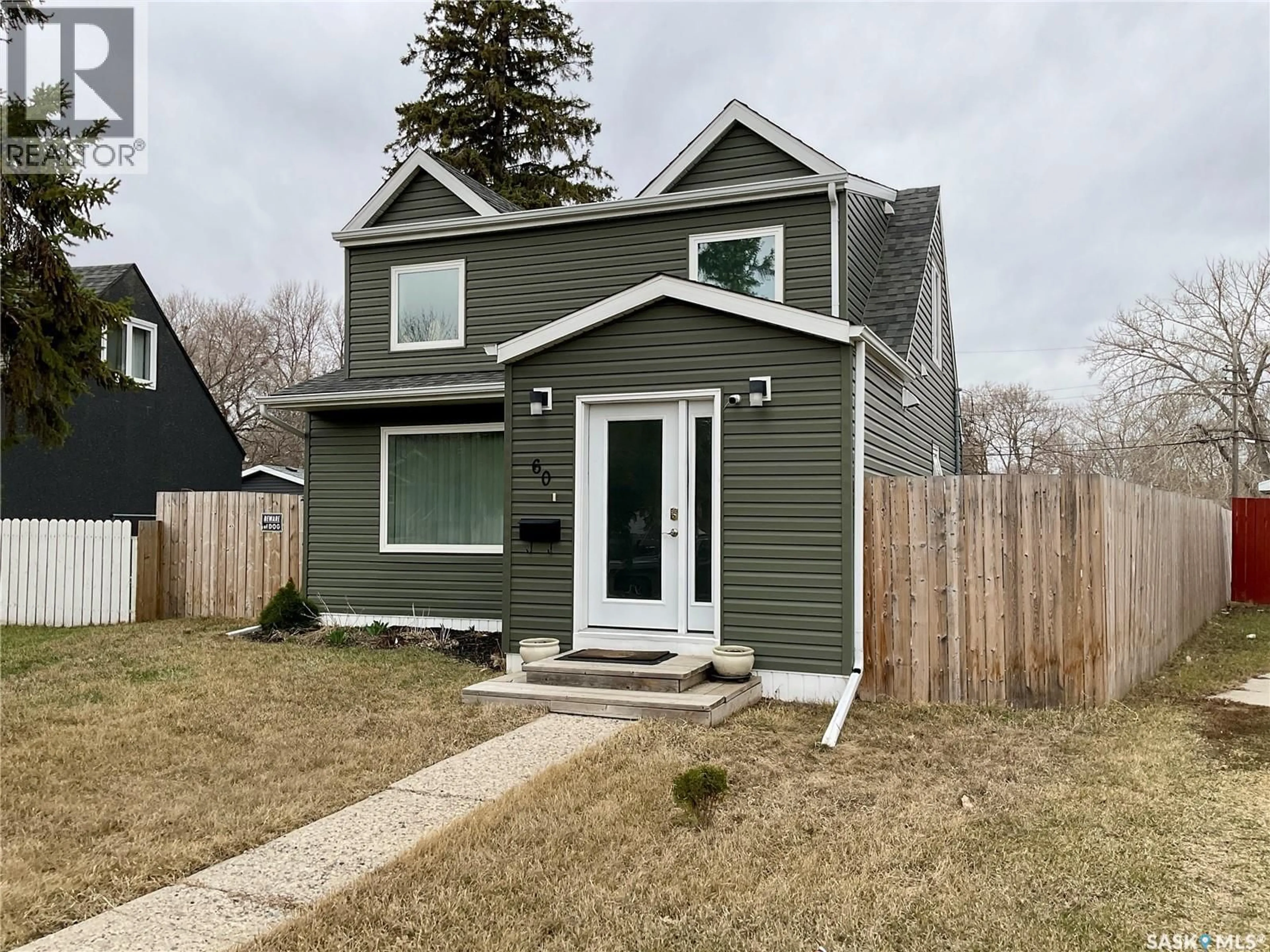 Home with vinyl exterior material, street for 60 CHARLES CRESCENT, Regina Saskatchewan S4T5X4